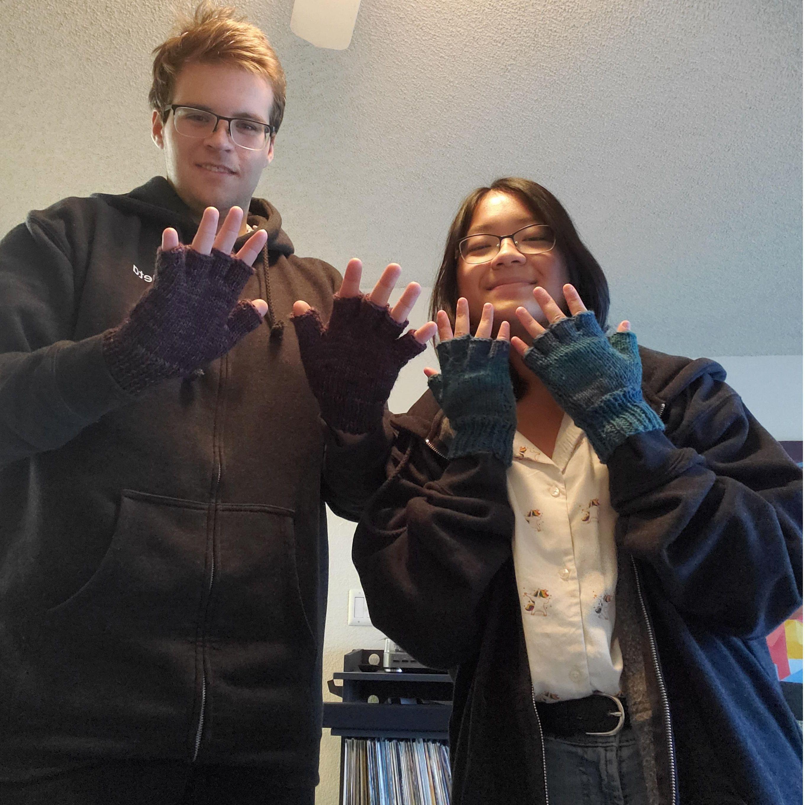(2023) Trying on our gloves from Grandma!