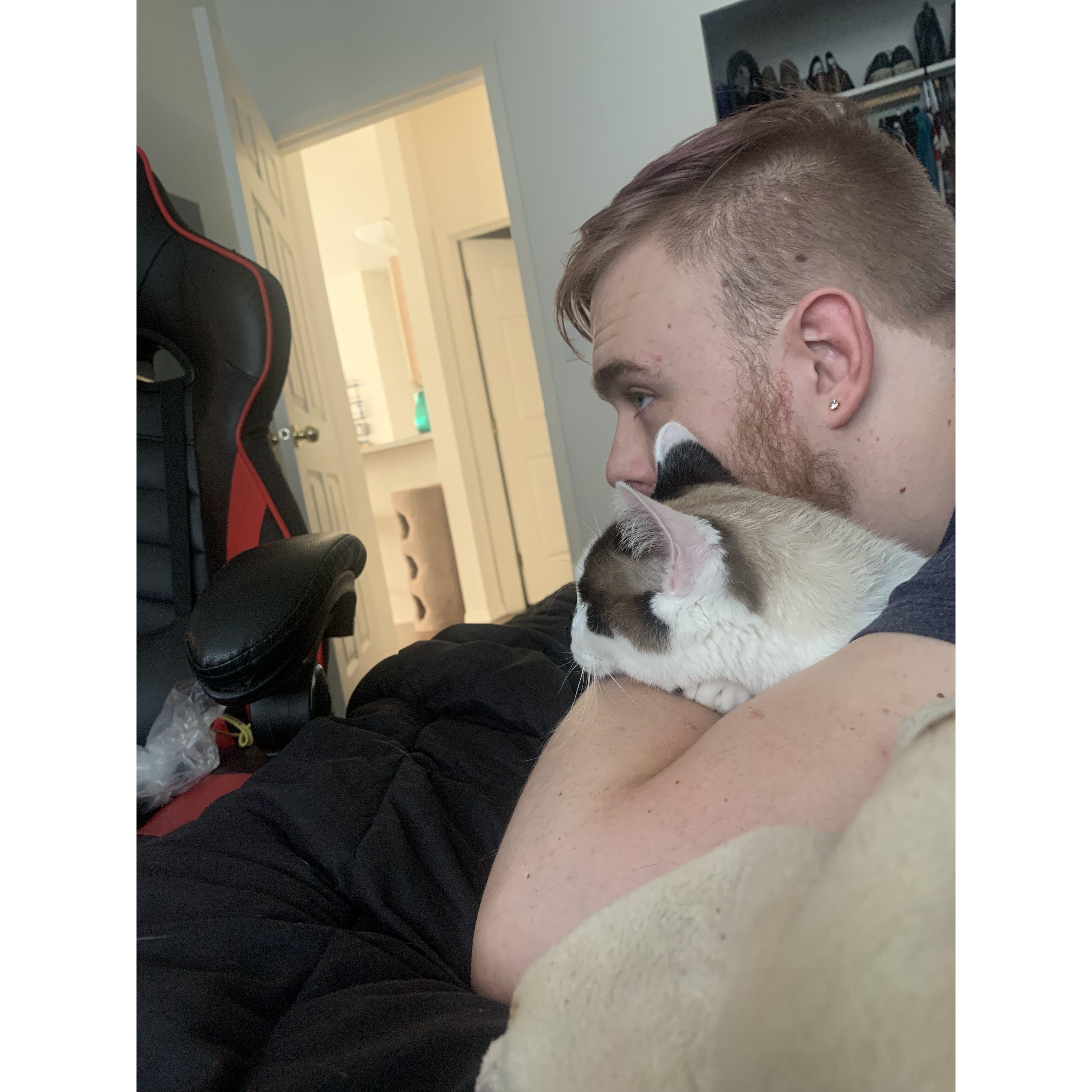 Will and our cat Odin watching anime 