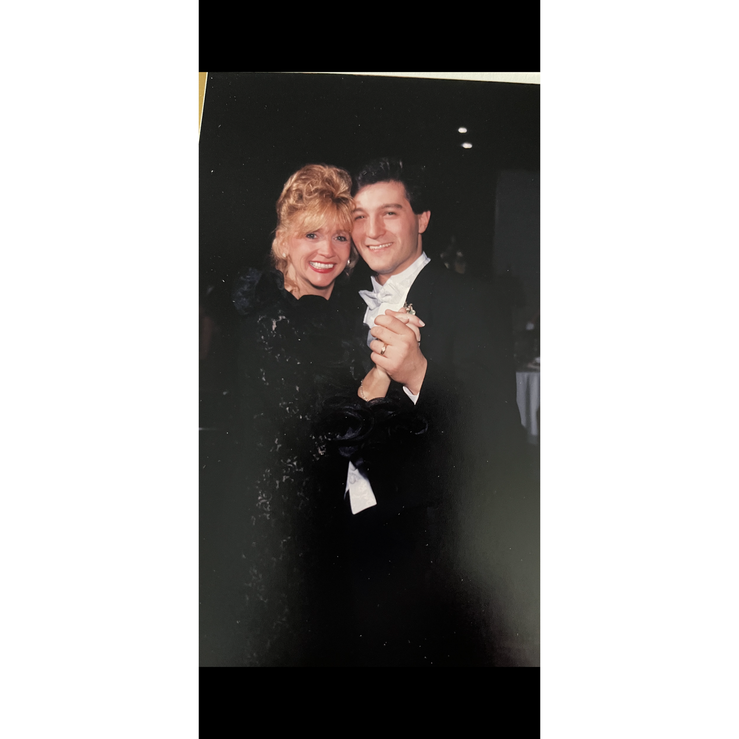 Susan Casella dancing with her son