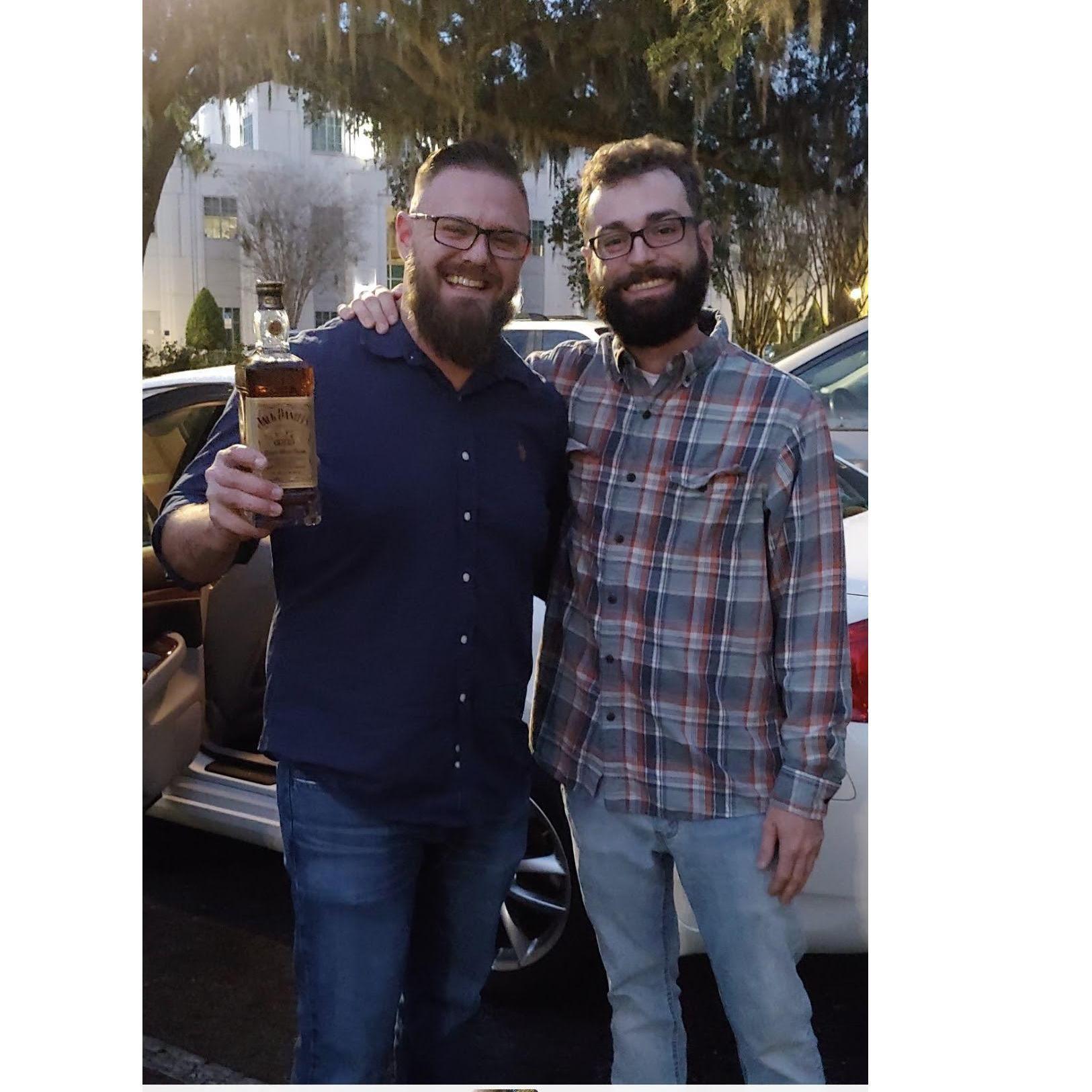 Garrett and his guy Brian taking shots out of the bottle.