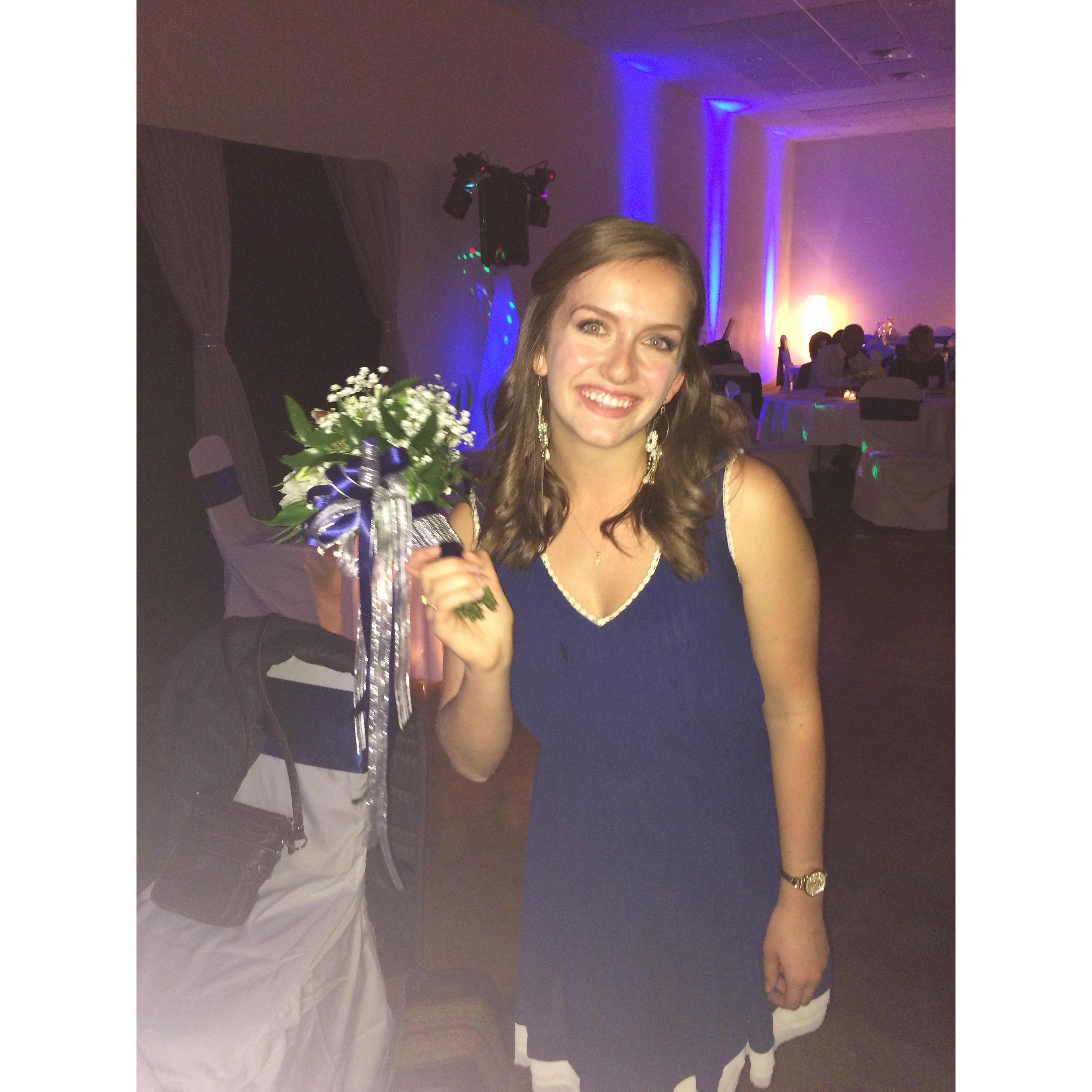 Catching Kara's (Trey's sister's) bouquet shortly after we began dating.