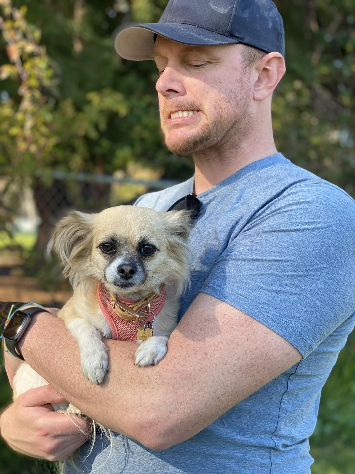 That time when Eric looked all manly while holding a puppy.