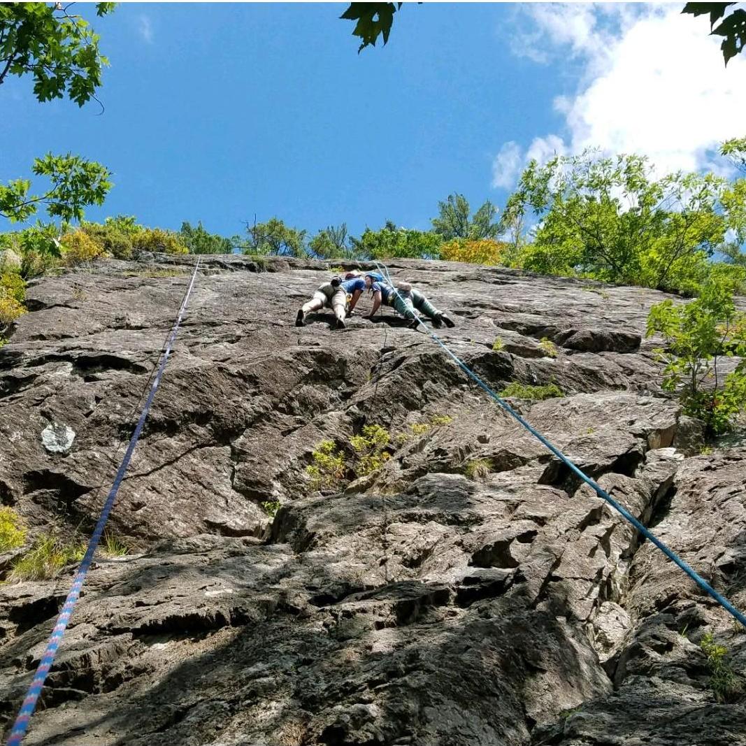 Climbing a new wall in Camden Hills
