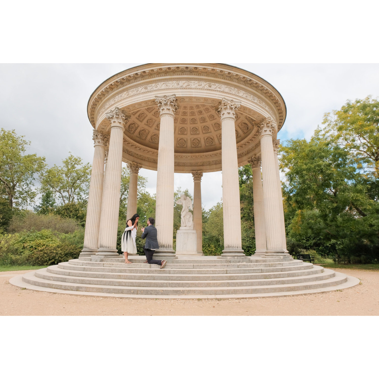 The moment he proposed in the gardens at Versailles!