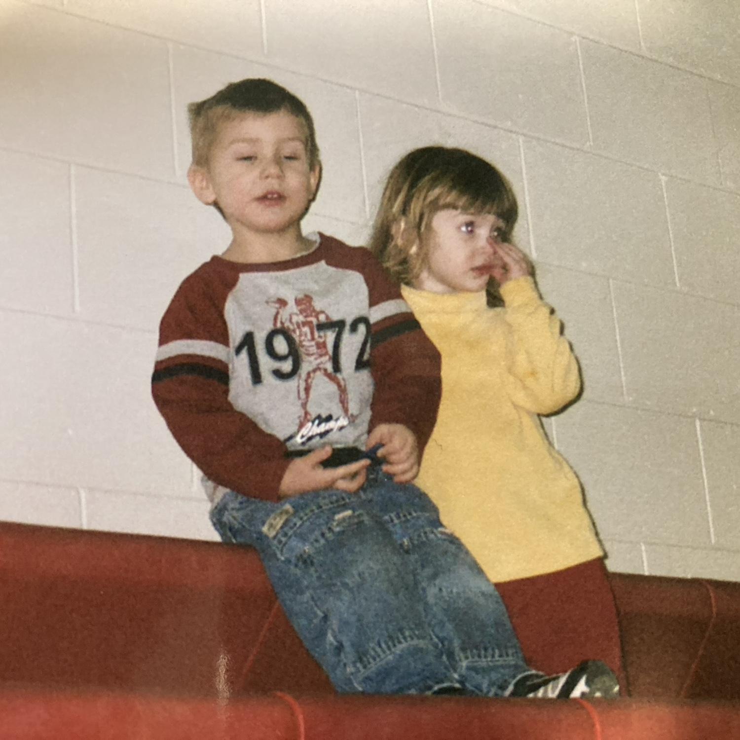 Mitchell and Emily at their older sisters' (Sarah Scholl & Alli Bousquet) basketball game!