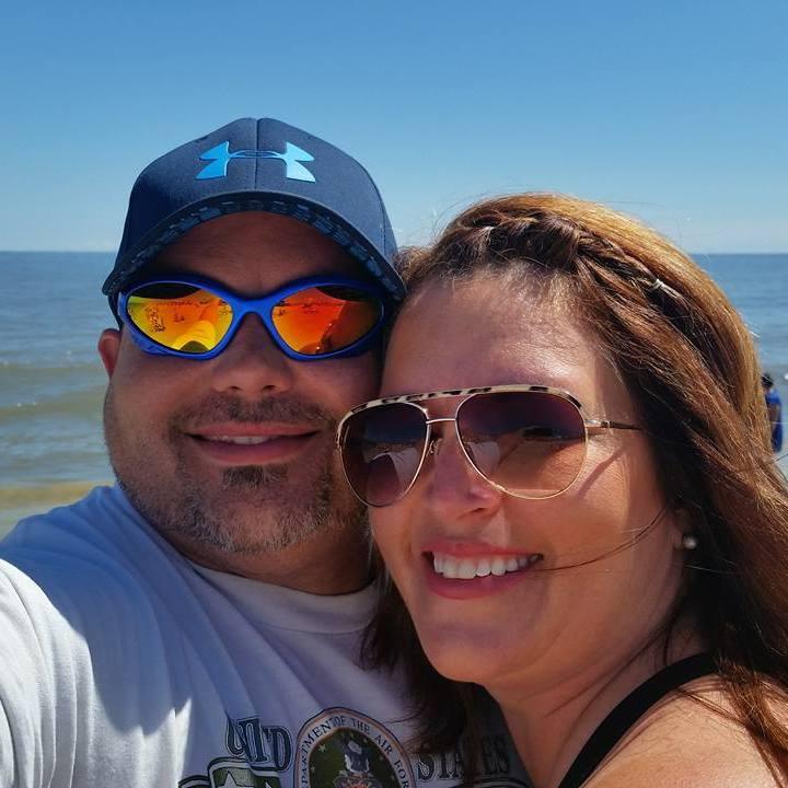 The beach makes me smile, and I make Adam smile!