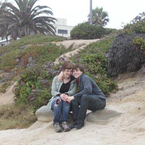 The very first picture of the two of us together, taken on a beach in San Diego.