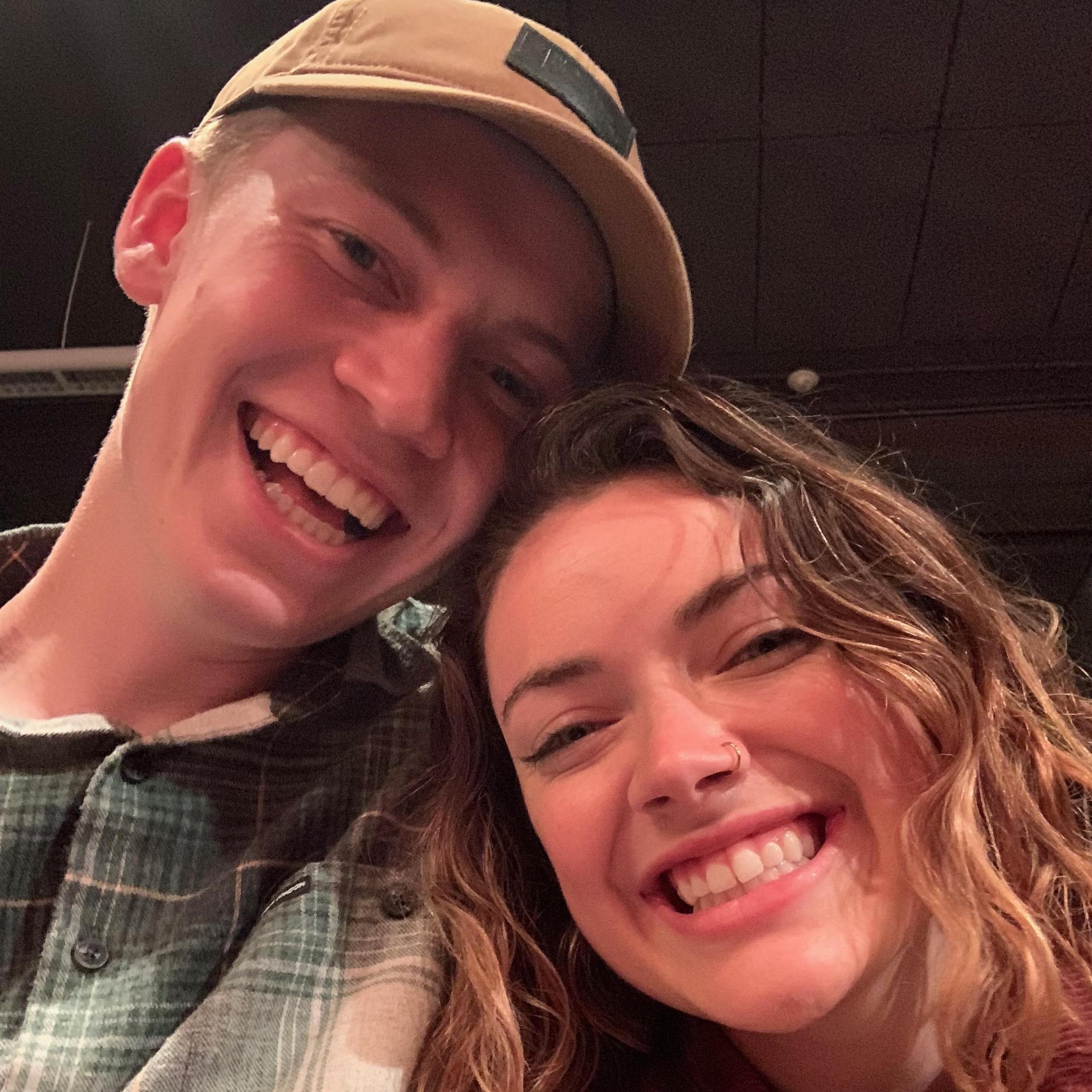 My beautiful bride to be and I sitting front row at a local concert jamming out!