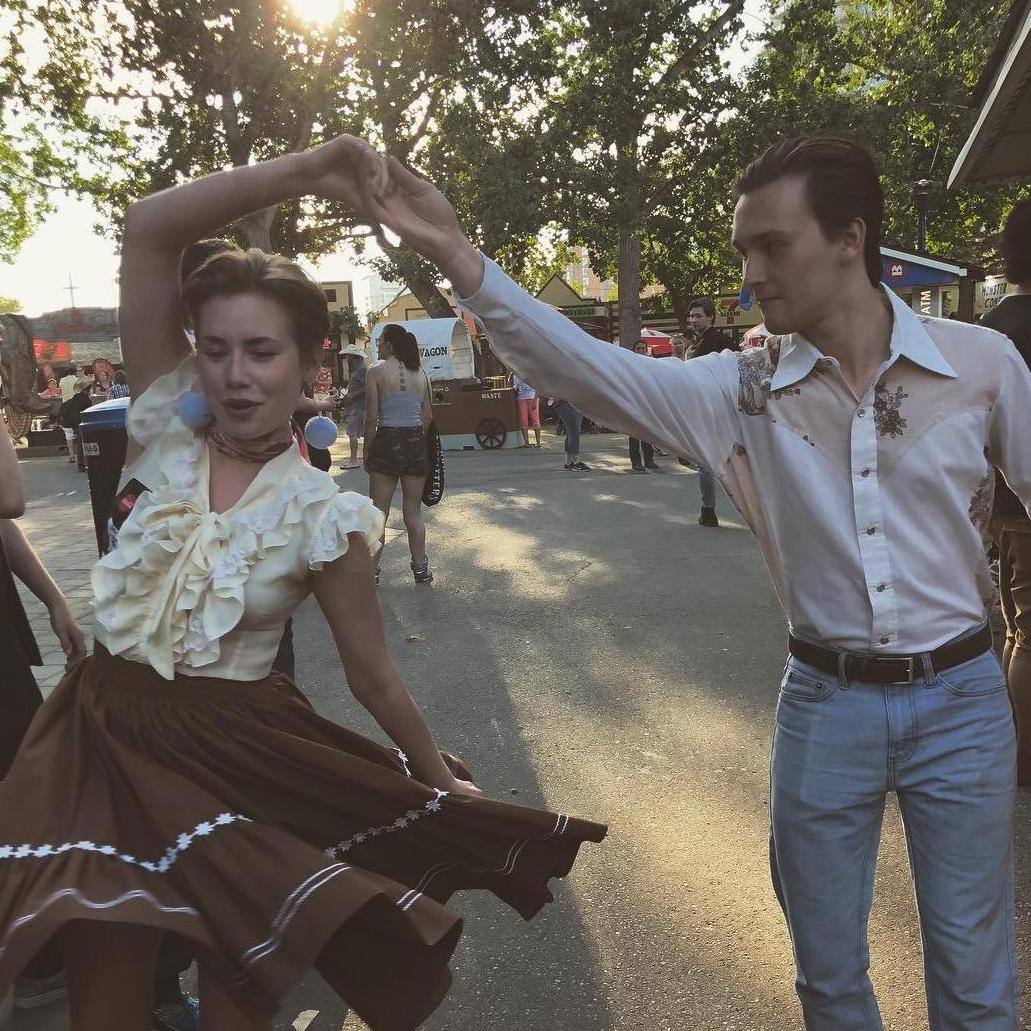Doing a spin at Stampede with coordinated western outfits 🤠!!