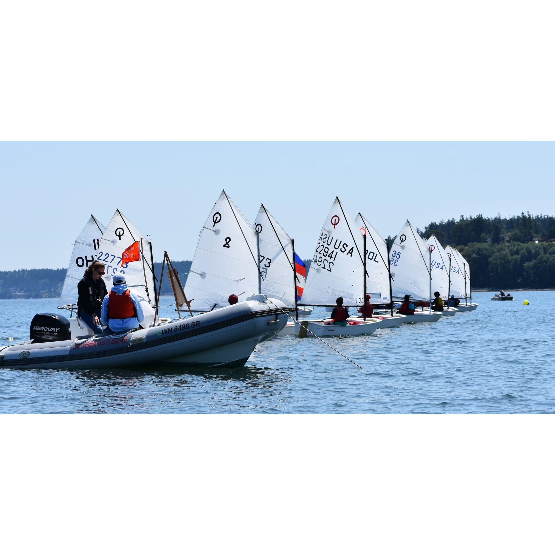 One of our first photos together, a professional pic of Marika and Shawn doing race committee in Oak Harbor