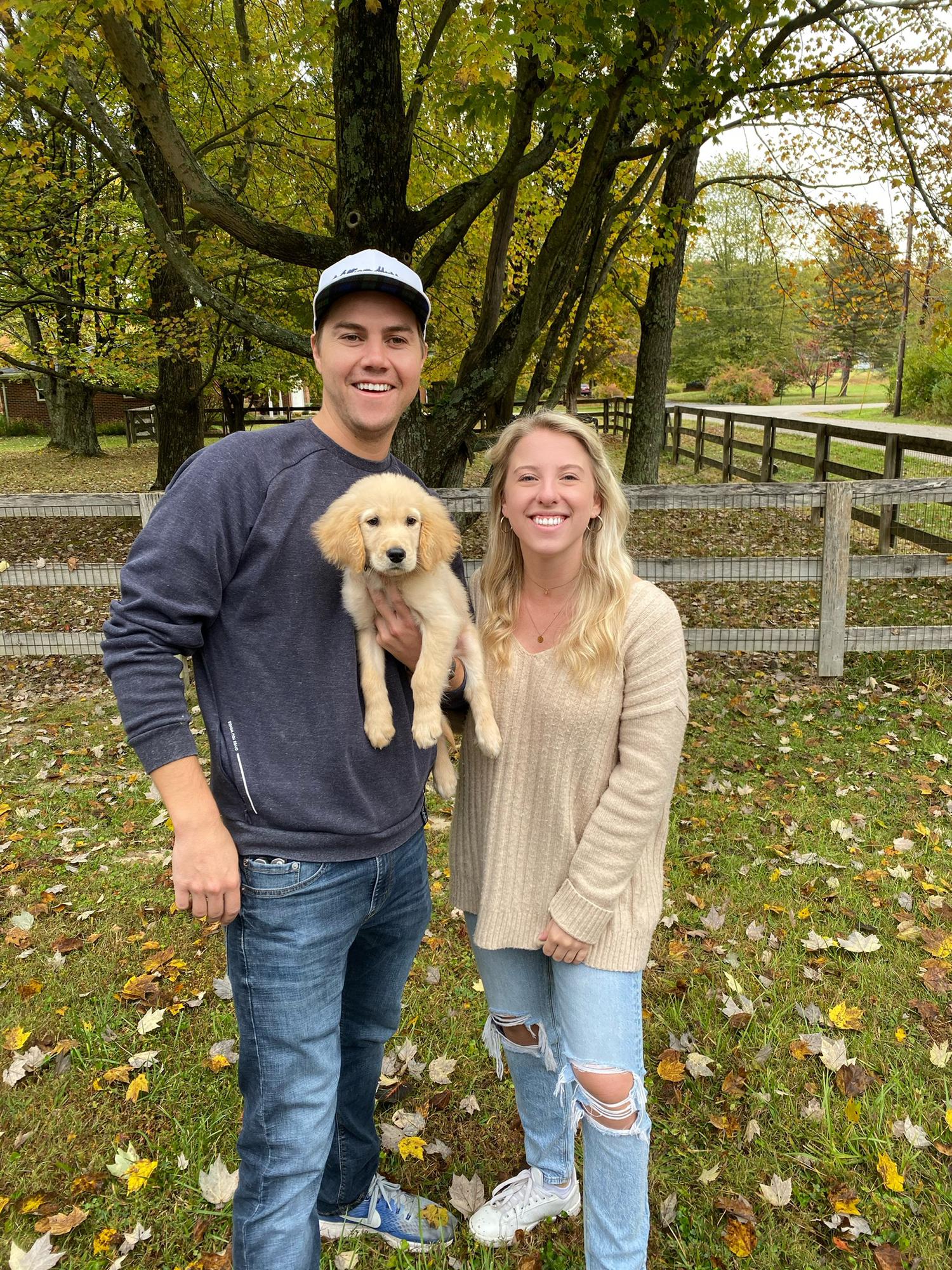 Welcoming their new puppy, Rory, into the family.