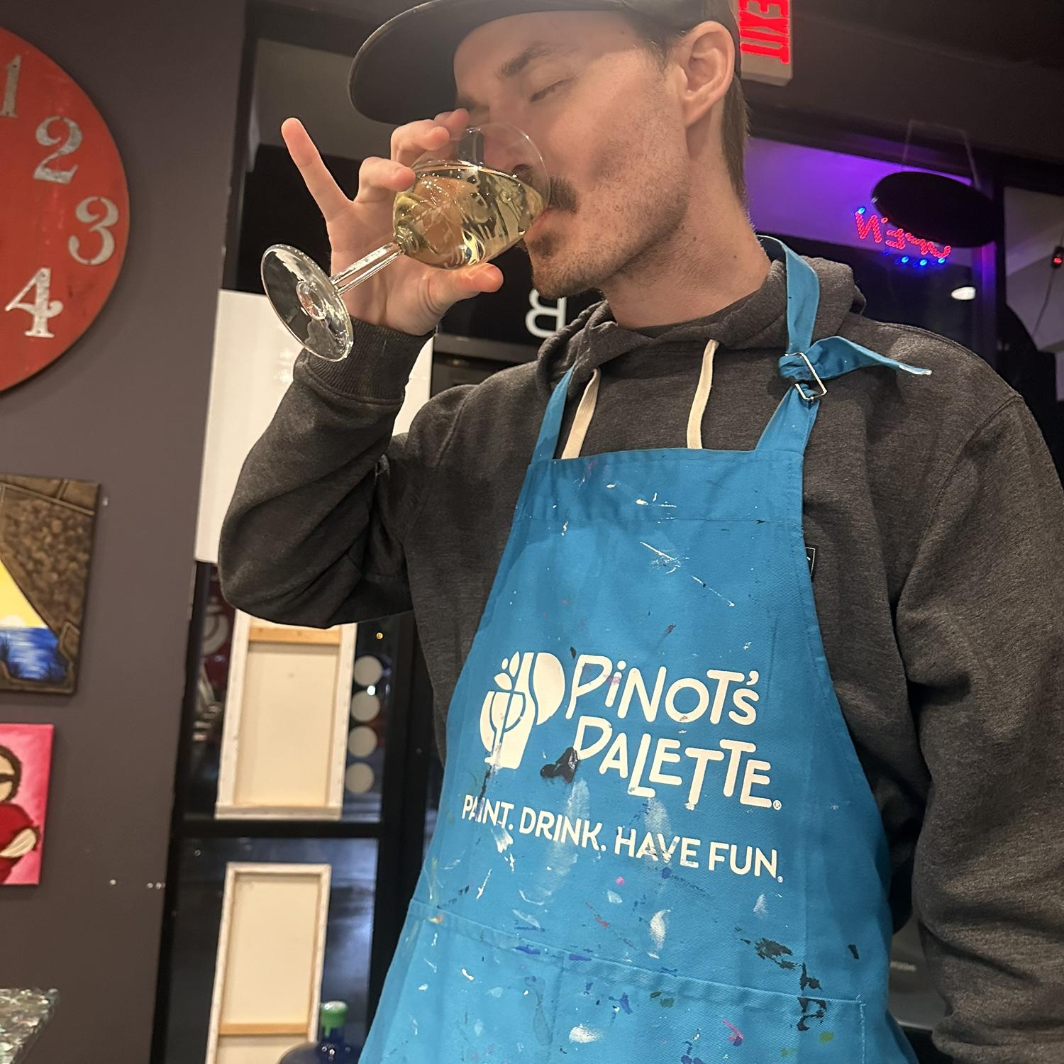 Kevin pretends to suffer through wine and paint night, but does this look like a man suffering??