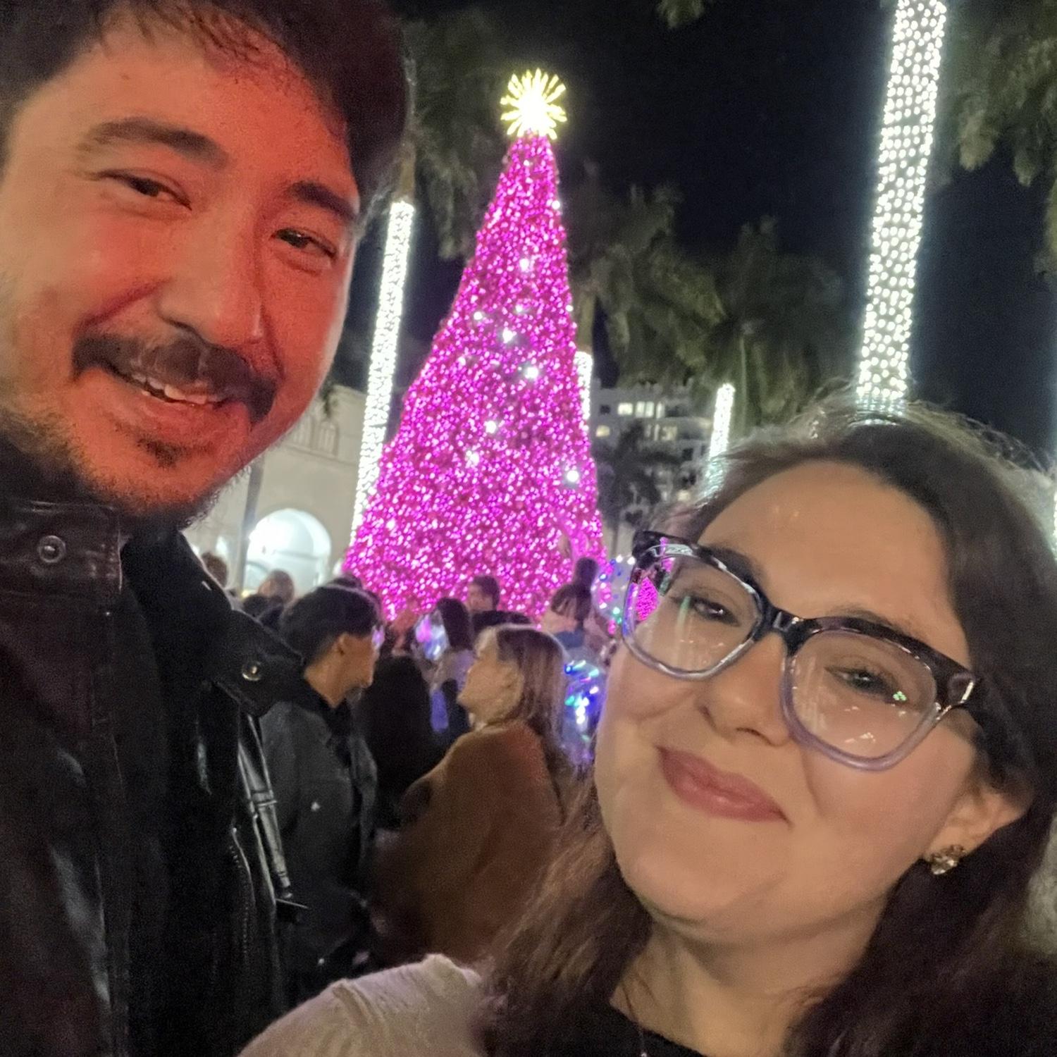 Adam & Jacqueline attending a Christmas tree lighting in Mizner park