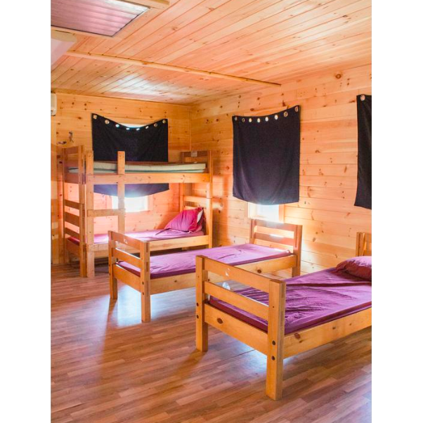Indoor look into cabin bunks. AC included.