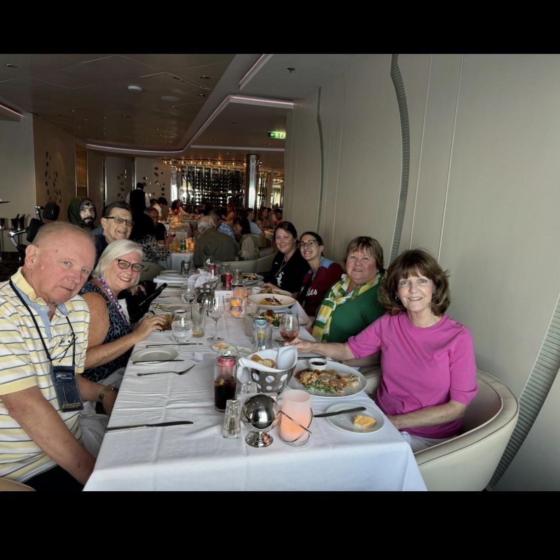 meg, her family and i at dinner on the cruise ship on the way to bermuda.