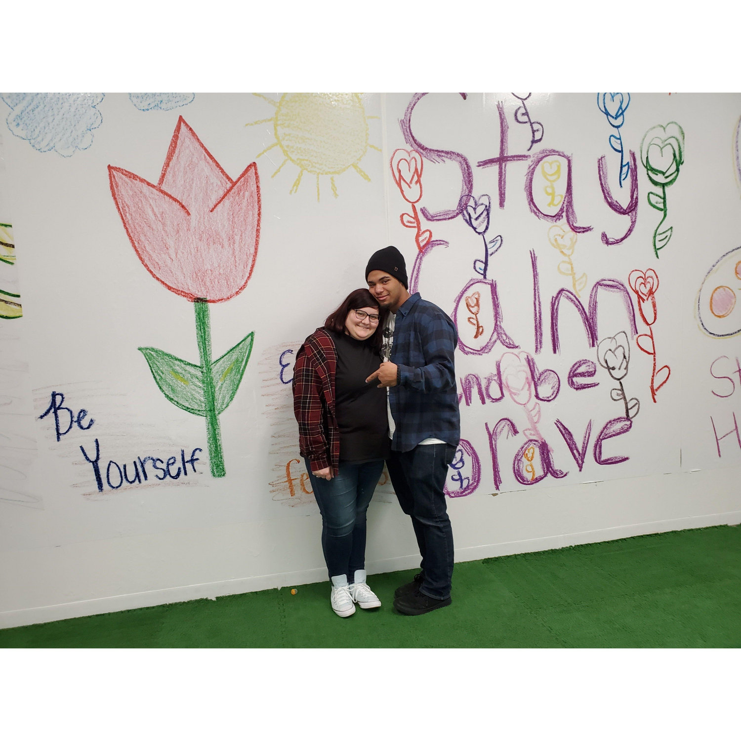 Probably our first picture as a couple that we took on a random trip to the mall with friends!