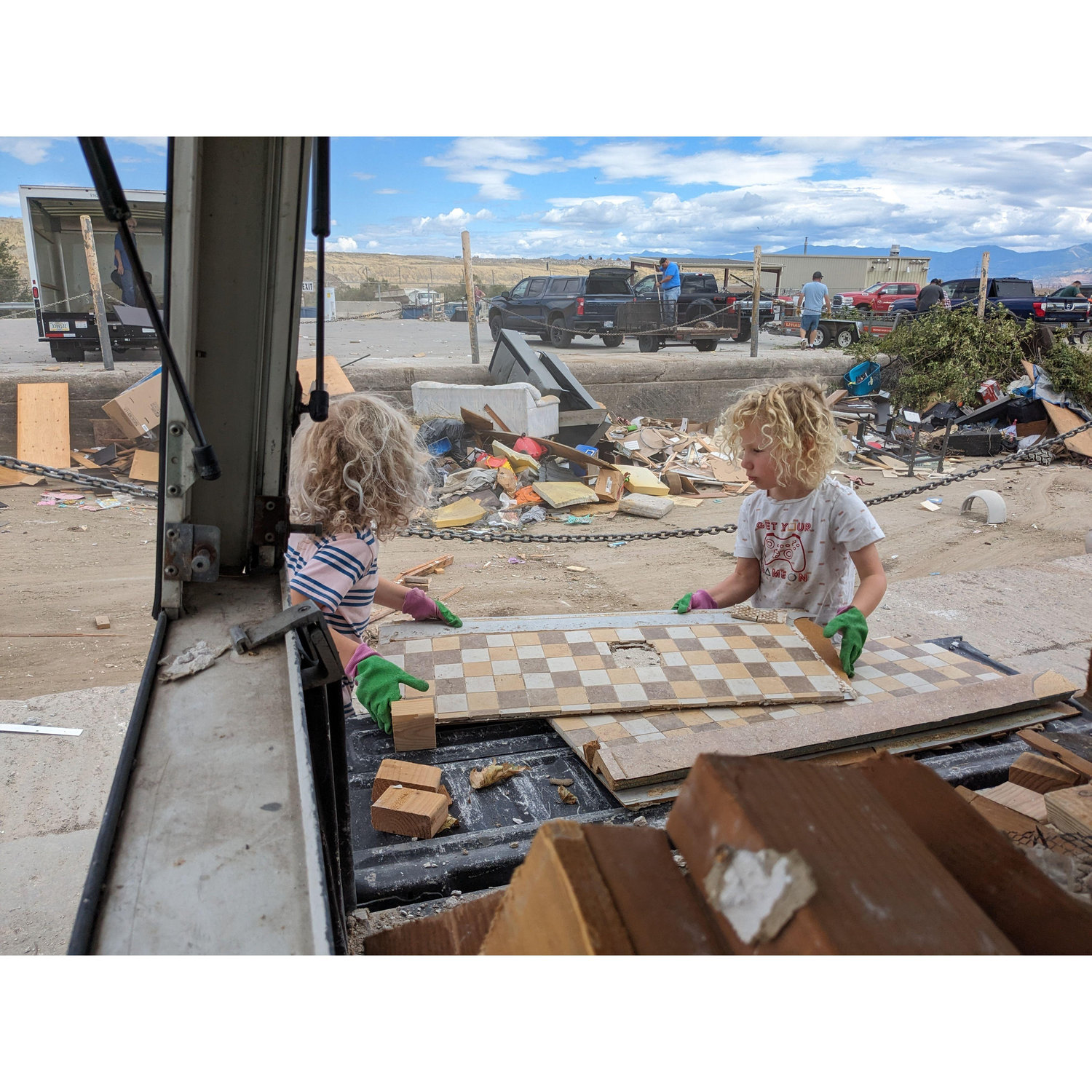 Boys helping on a dump run
