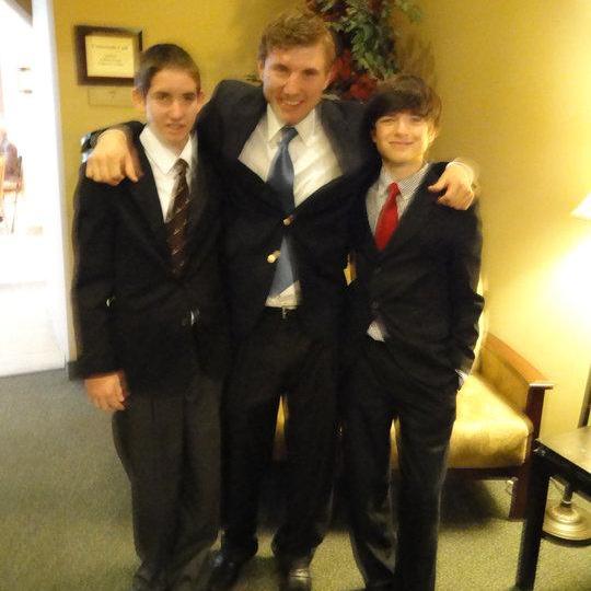 Johnny and our bro's back in 2010 (Pete on the left and Matthew on the right).  I think they've grown just a bit since then....