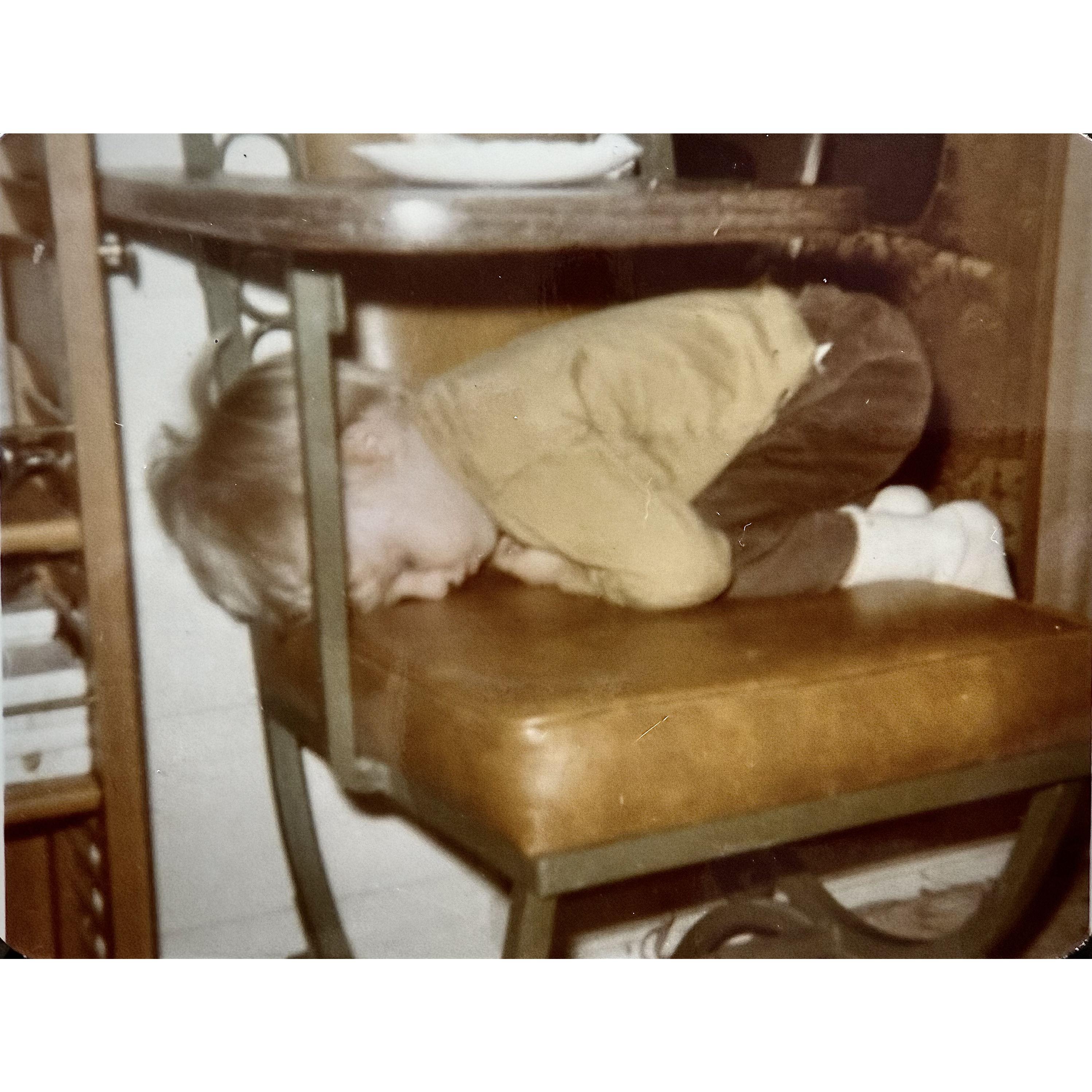 Proof that Wayne can sleep anywhere... even while waiting for his favorite fish sticks!