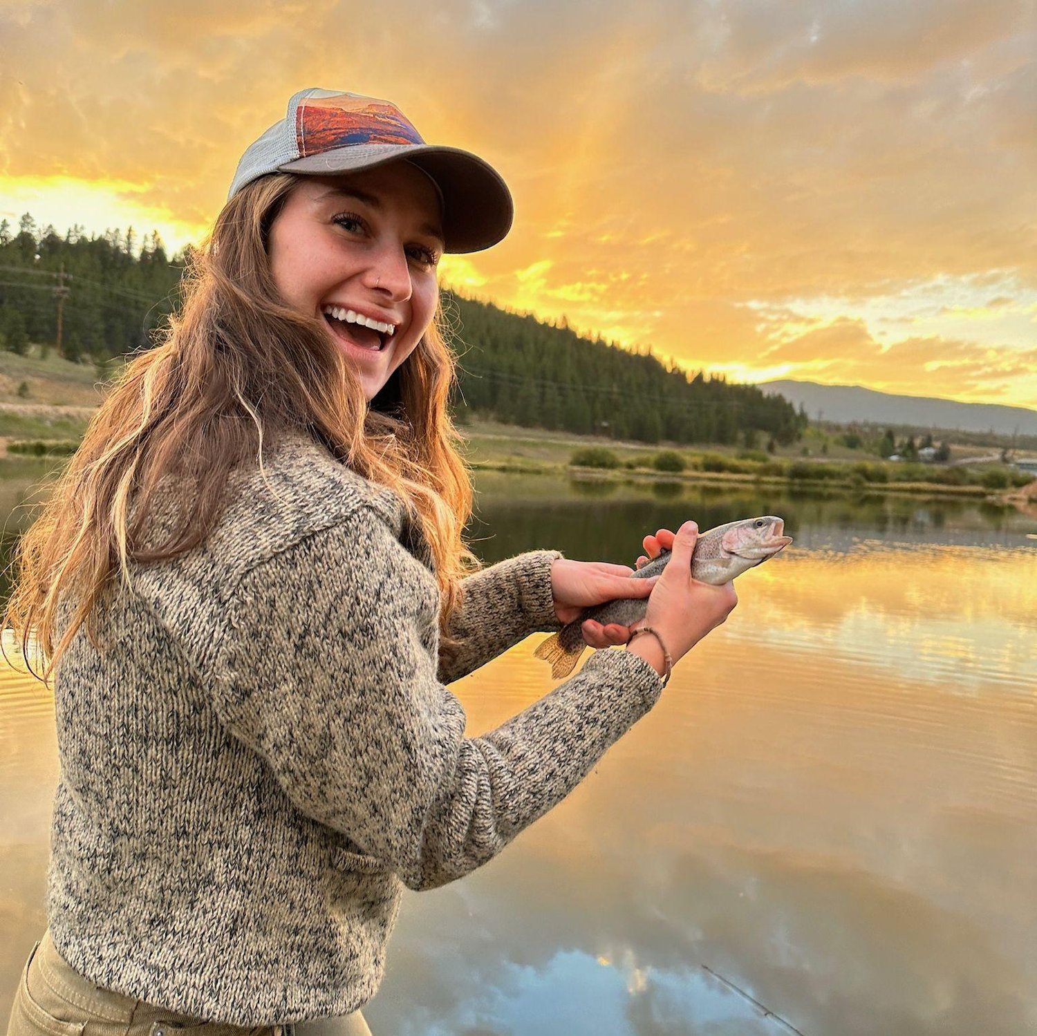If you look closely, Teya and the trout are making the same face.