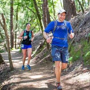 Trail running through the redwoods