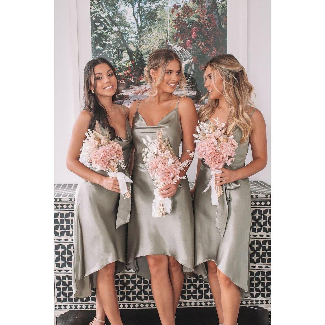 Bridesmaids dress, hair, jewelry, and bouquet