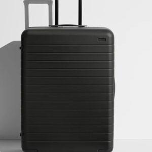 Shop Large & Checked Suitcases in Jet Black | Away