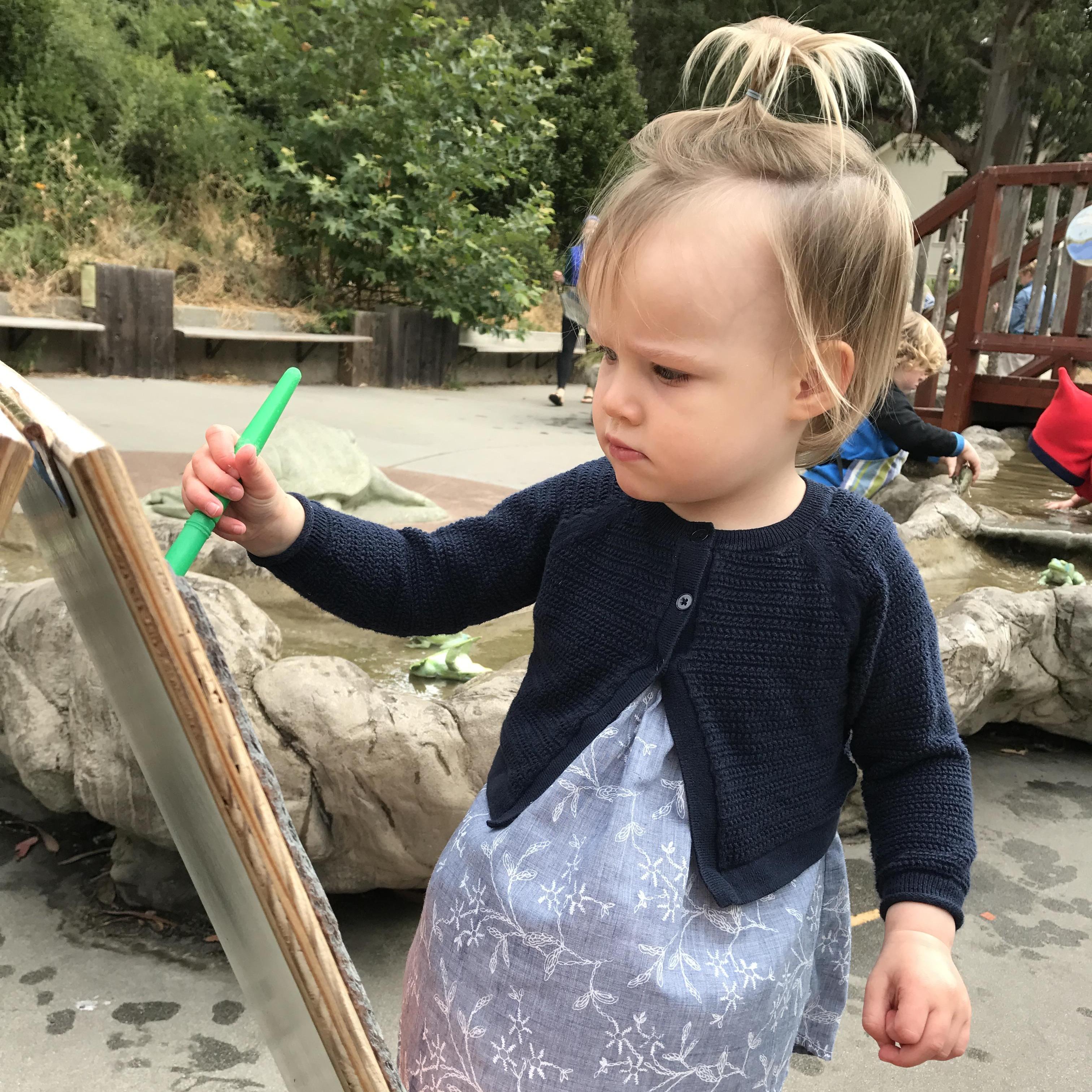 Wella (2 years) painting at the Discovery Museum in Sausalito.