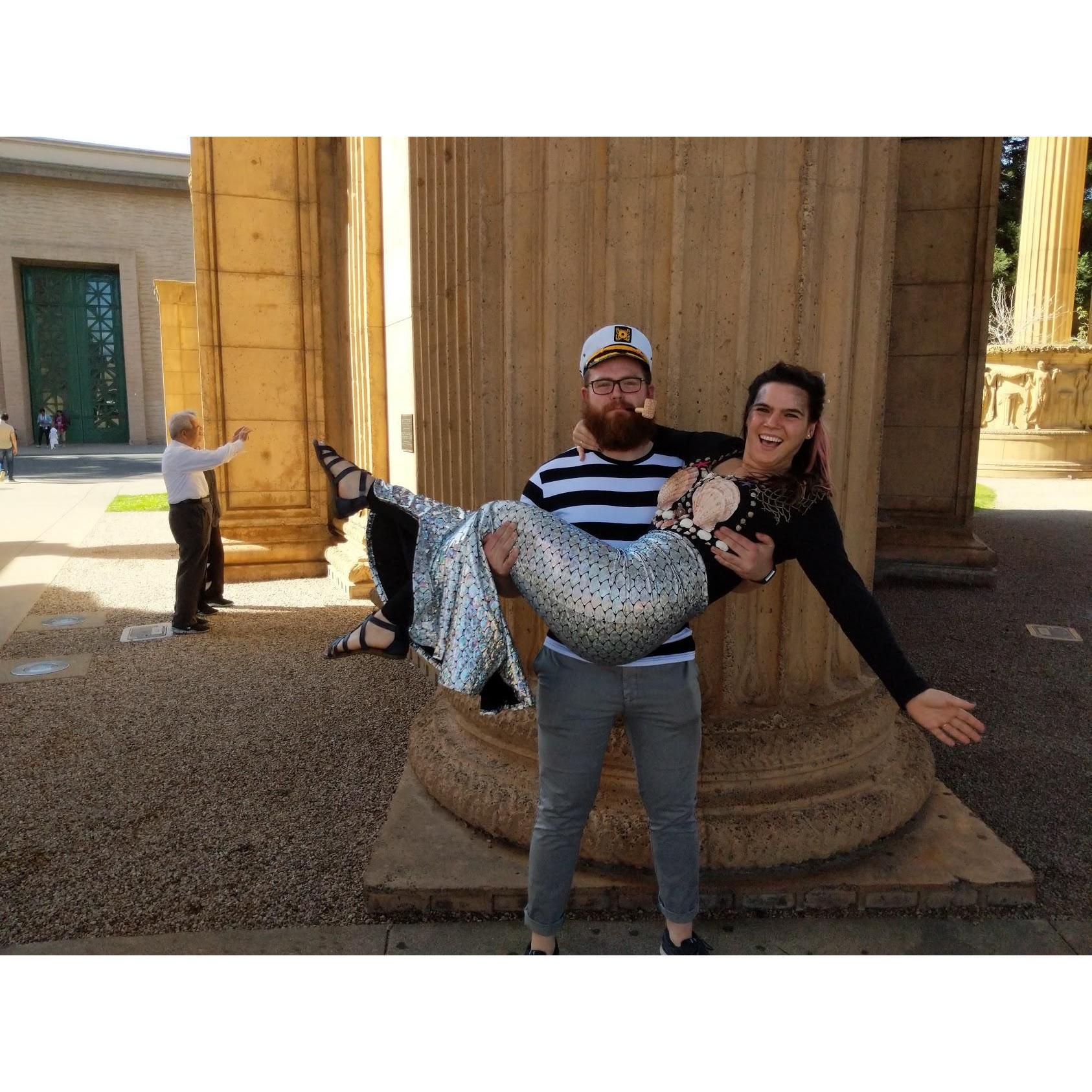 Look at the cute Asian man taking photos in the background
