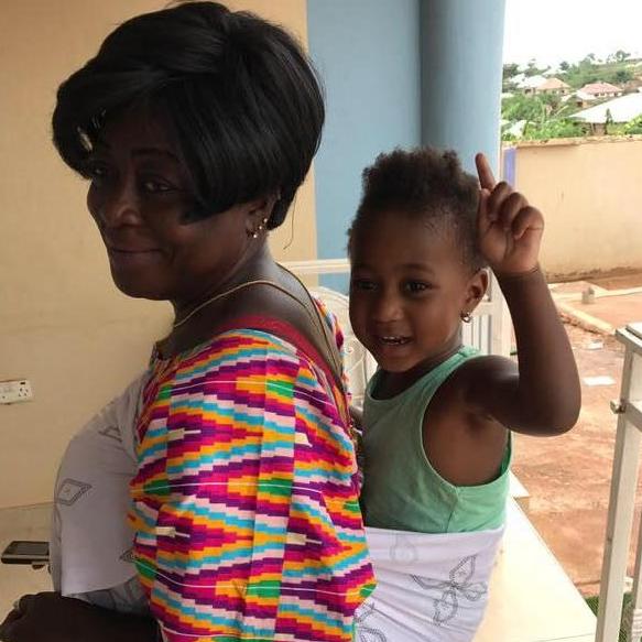 Grandma Gloria gives granddaughter Lulana a ride.