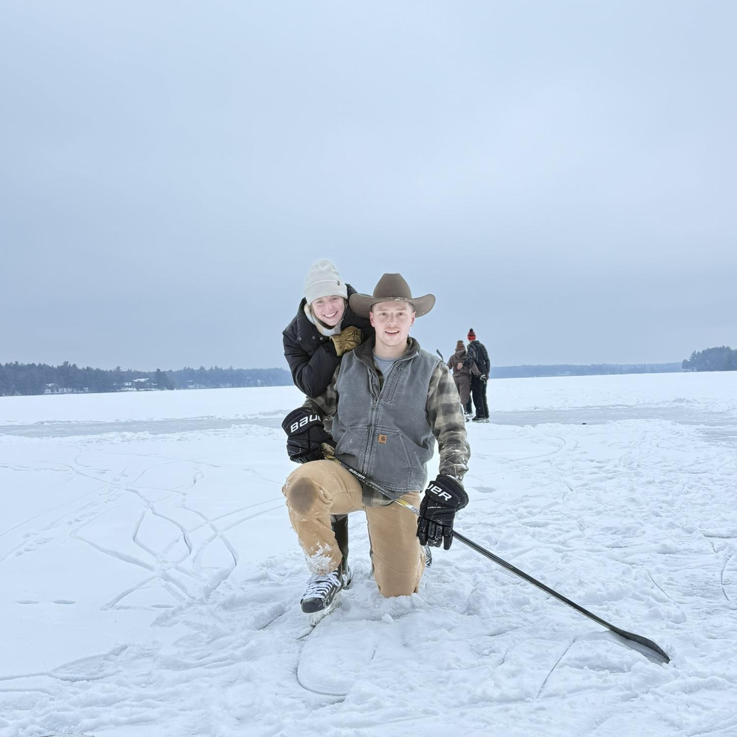 Tucker showing Izzy the pond hockey life🧊🏒