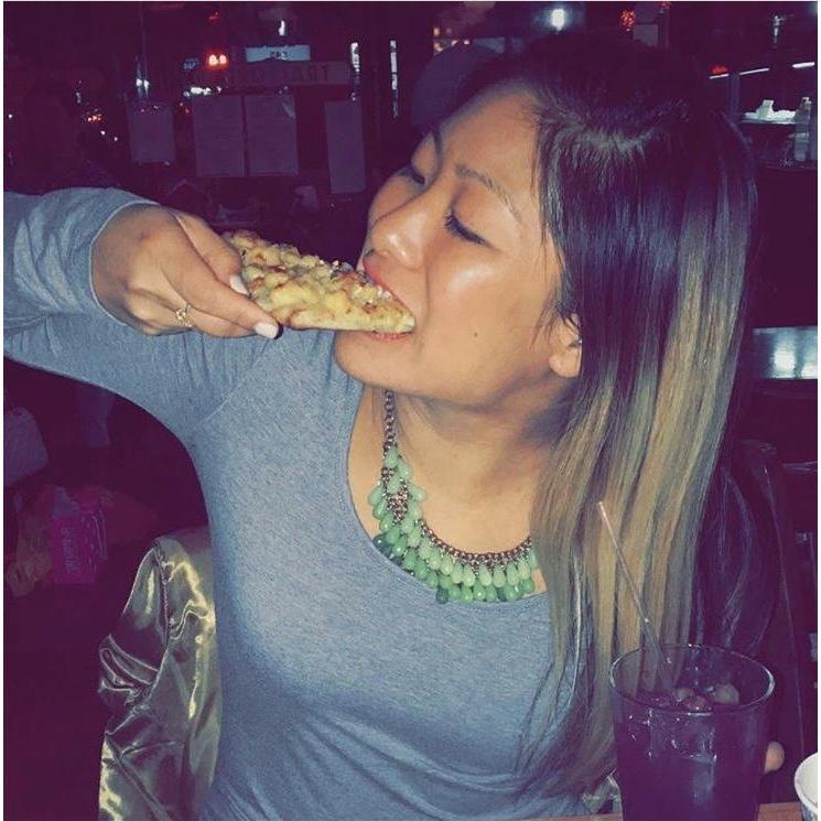 The picture that started it all, Denise eating mac n cheese pizza. (Hinge, 2017)