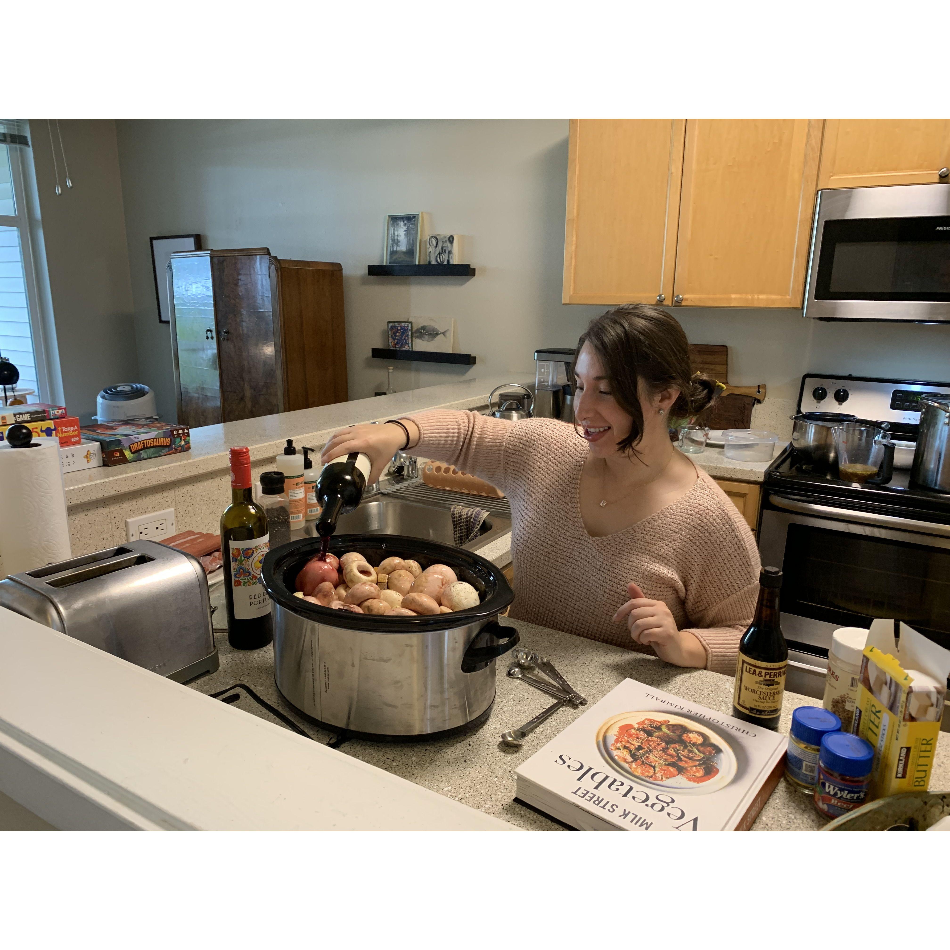Sylvana cookin "Burgundy Shrooms," one of our specialties! We made this batch for our annual "Over the Garden Wall" party in October 2022