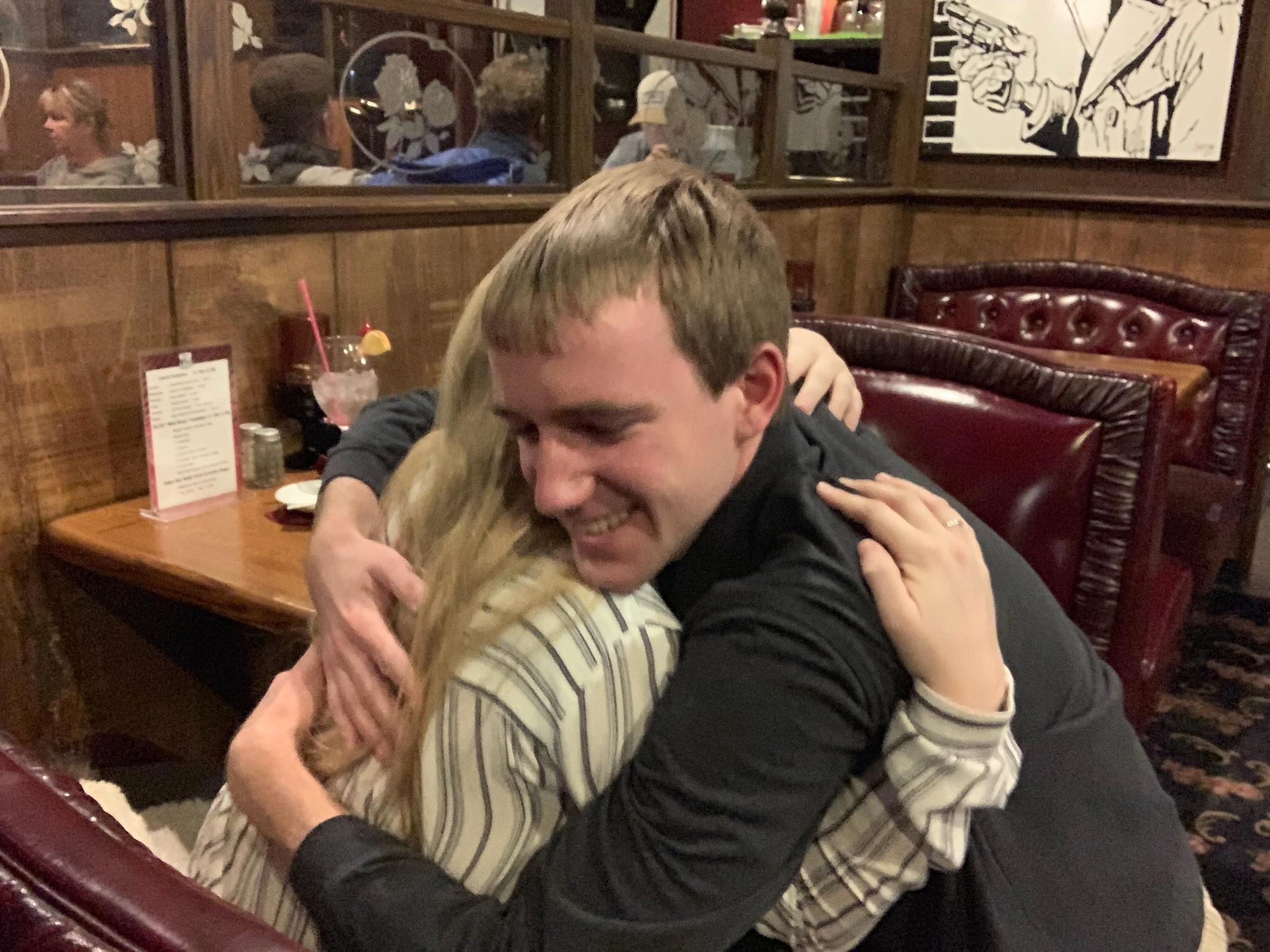 The hug right after Colton got down on one knee and Janielle said yes!