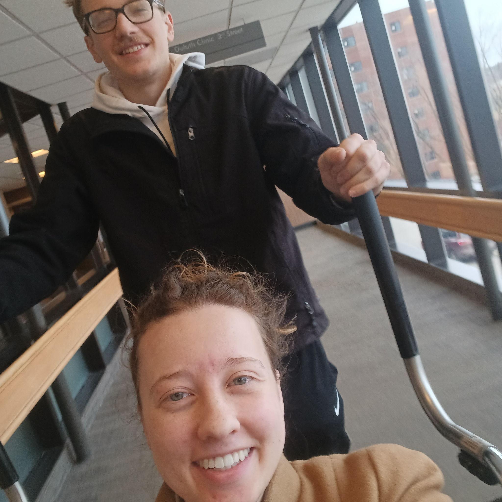 Daniel taking me to get stitches in my leg