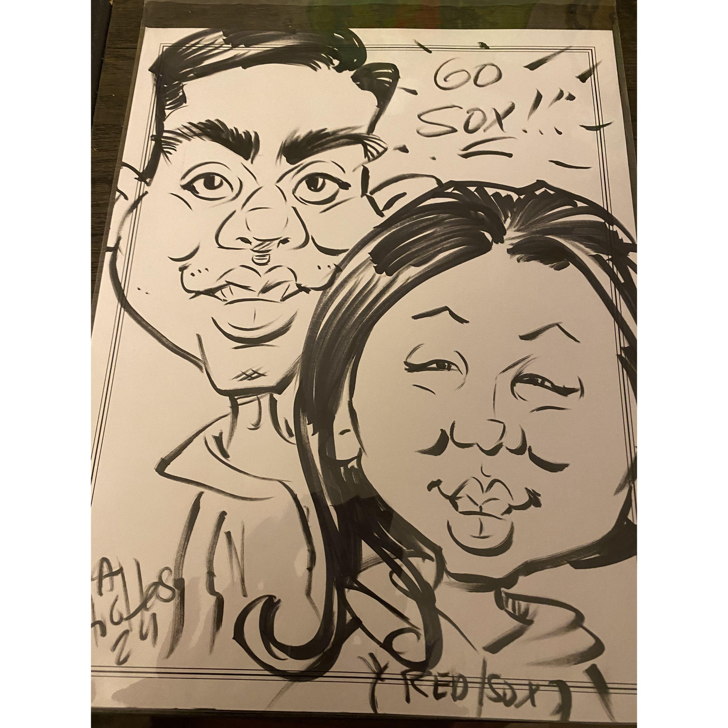 Our caricature at Friends and Family Day, at Fenway Park