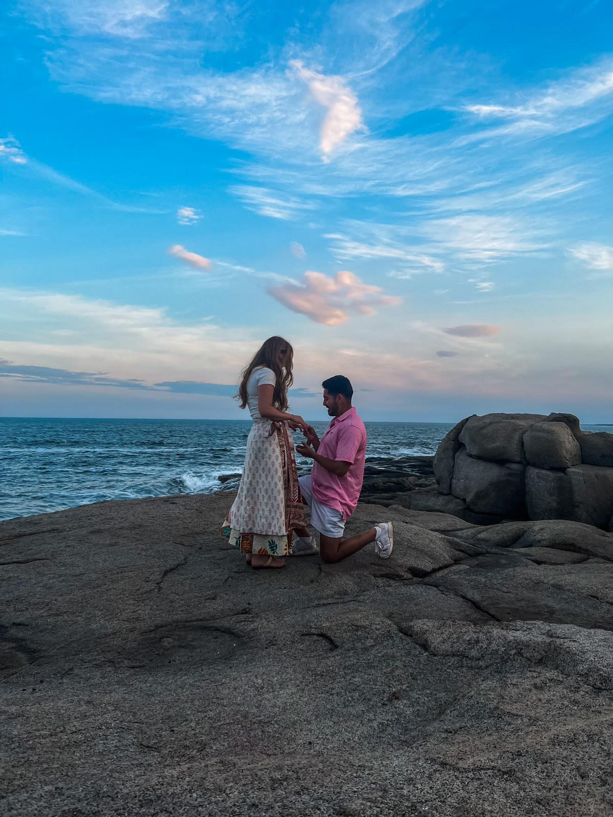 Esteban proposing to Mallory at Nubble Light in York Beach, Maine