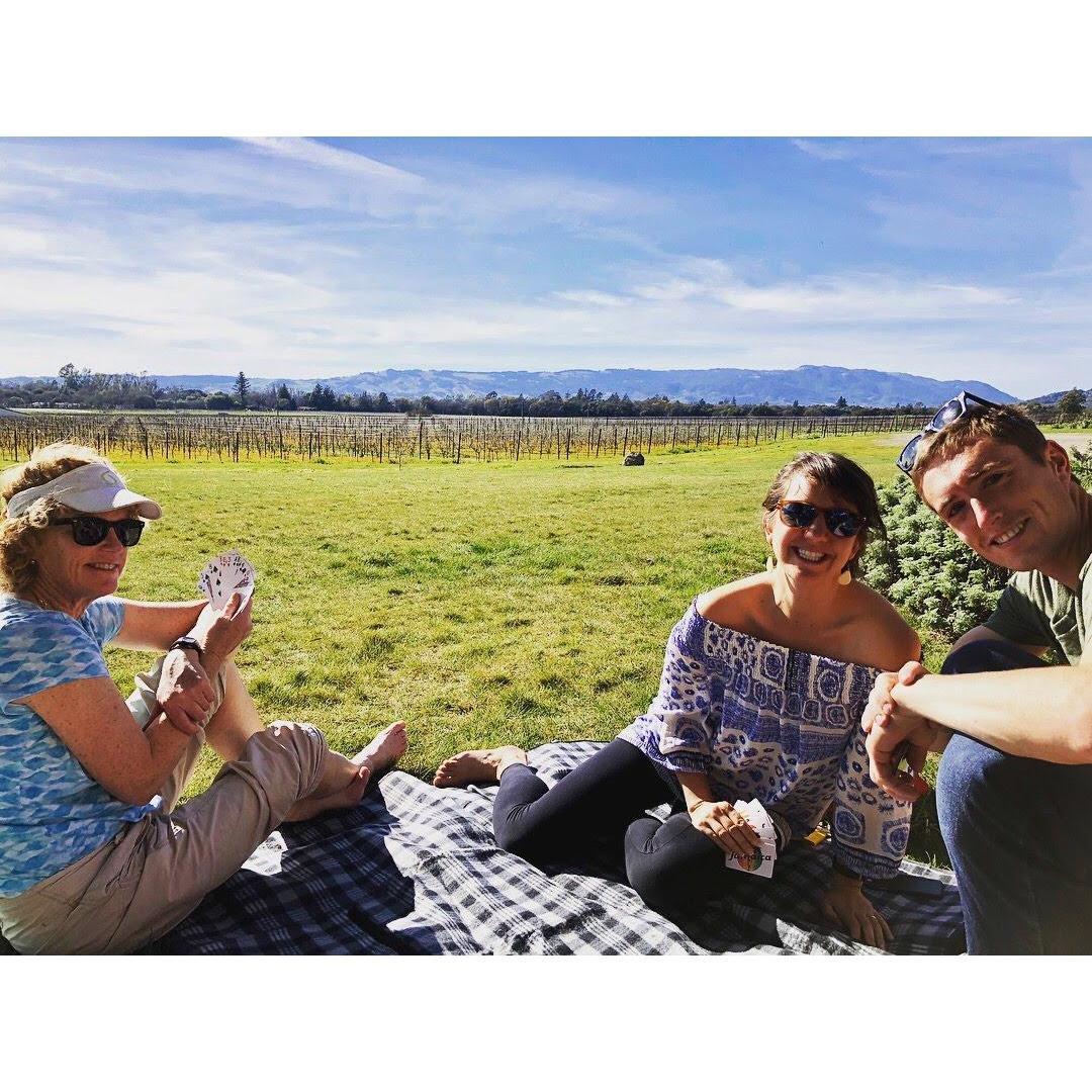 Playing hearts with Katie at Scribe vineyard in Sonoma