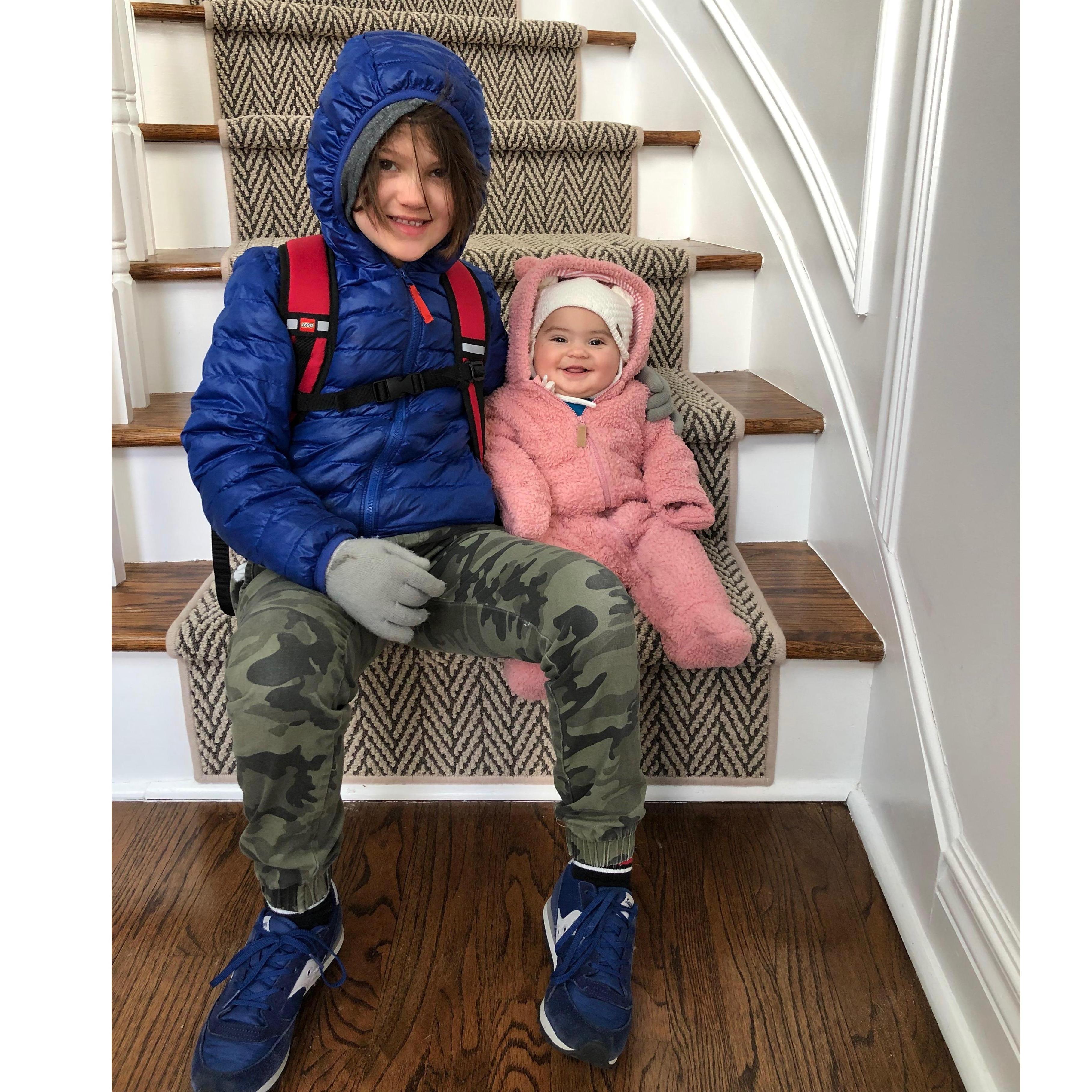 Penny and Agi waiting for the school bus.
