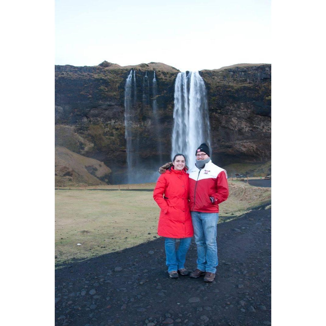 Adventures in Iceland. We both went behind that waterfall and got our legs soaked, but it was worth it.