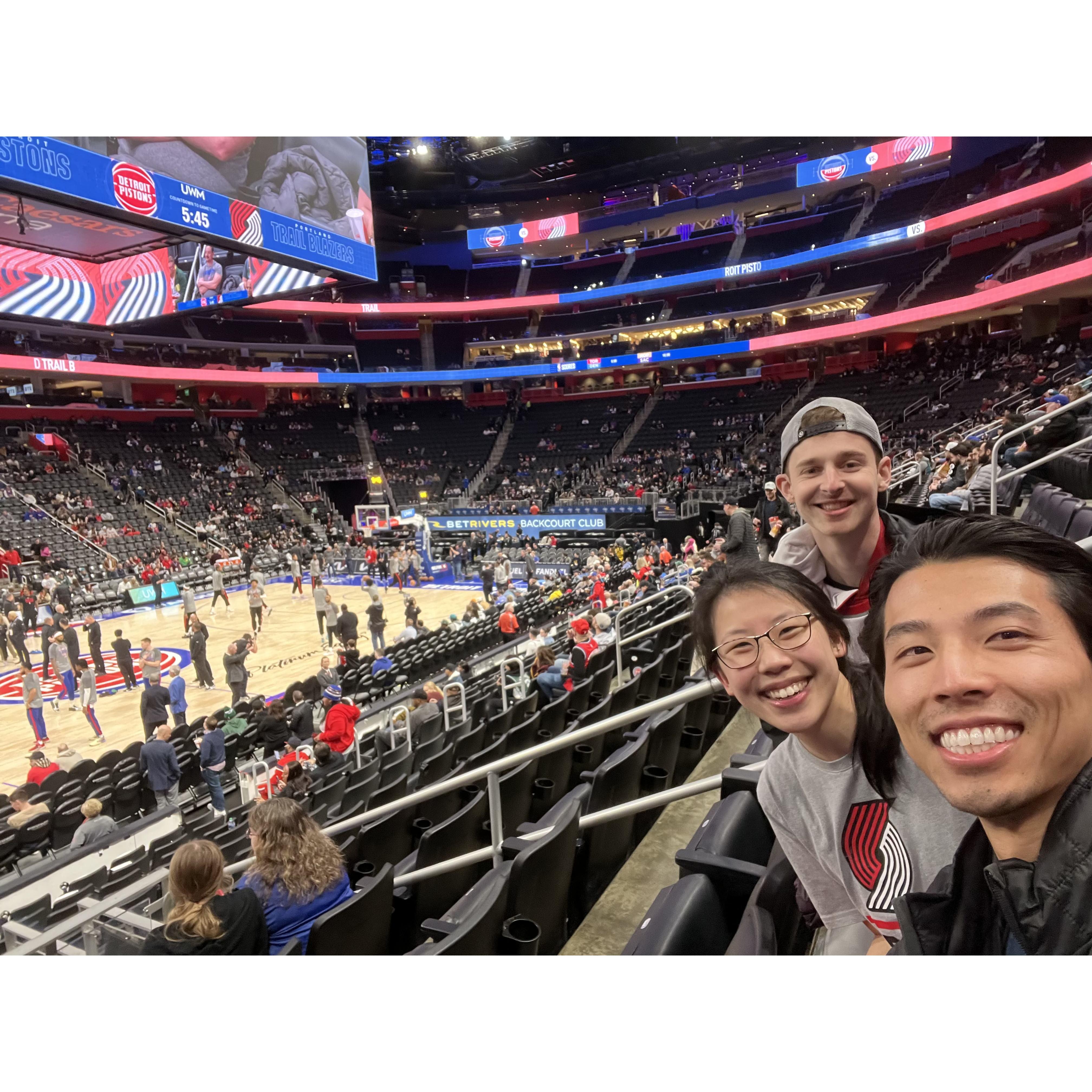 Watching an NBA game and sneaking to rows closer and closer to the court!