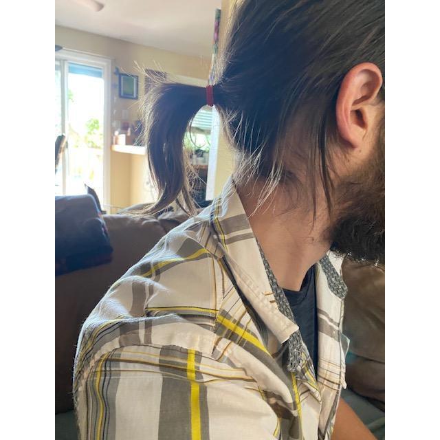 And as the pandemic grew longer, so did Nate's ponytail...