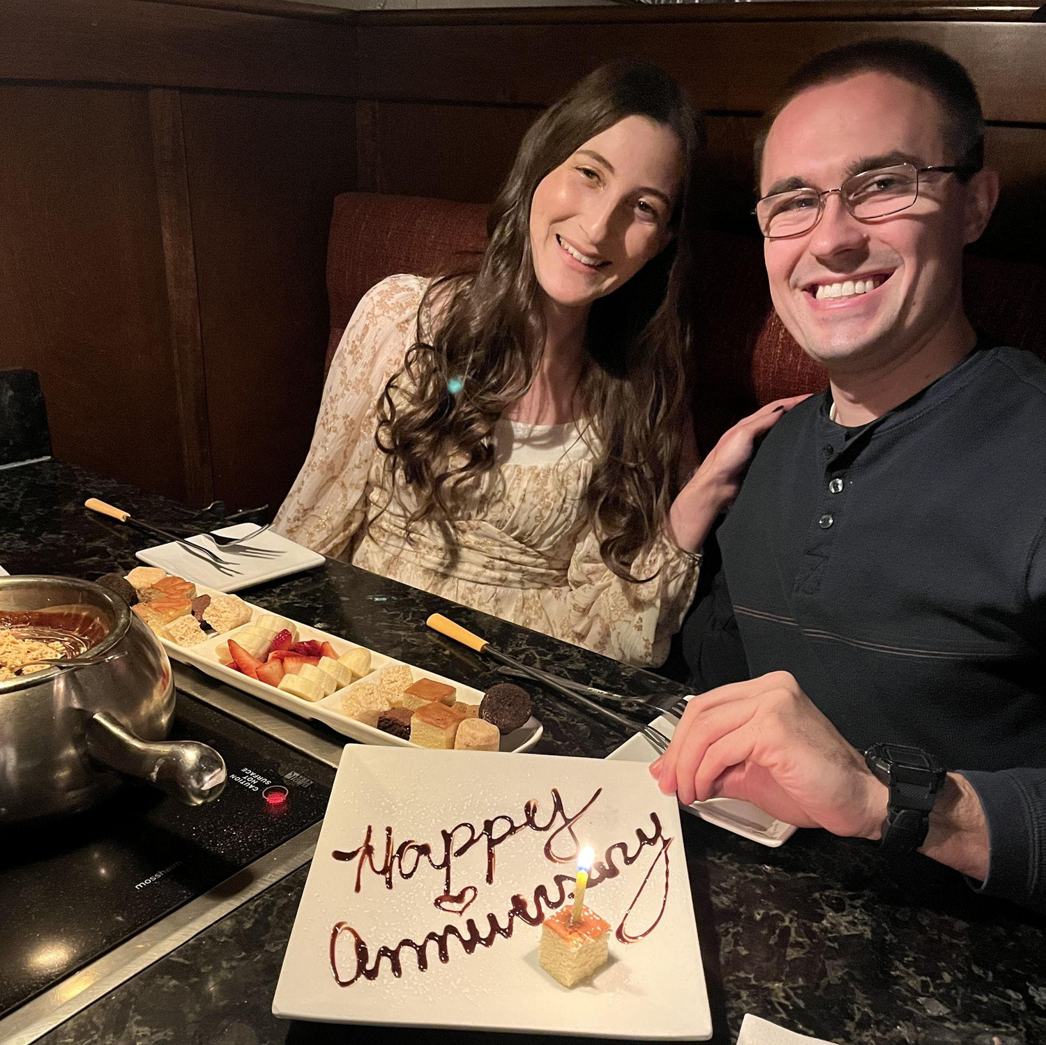 Celebrating our 2-year dating anniversary at the Melting Pot!