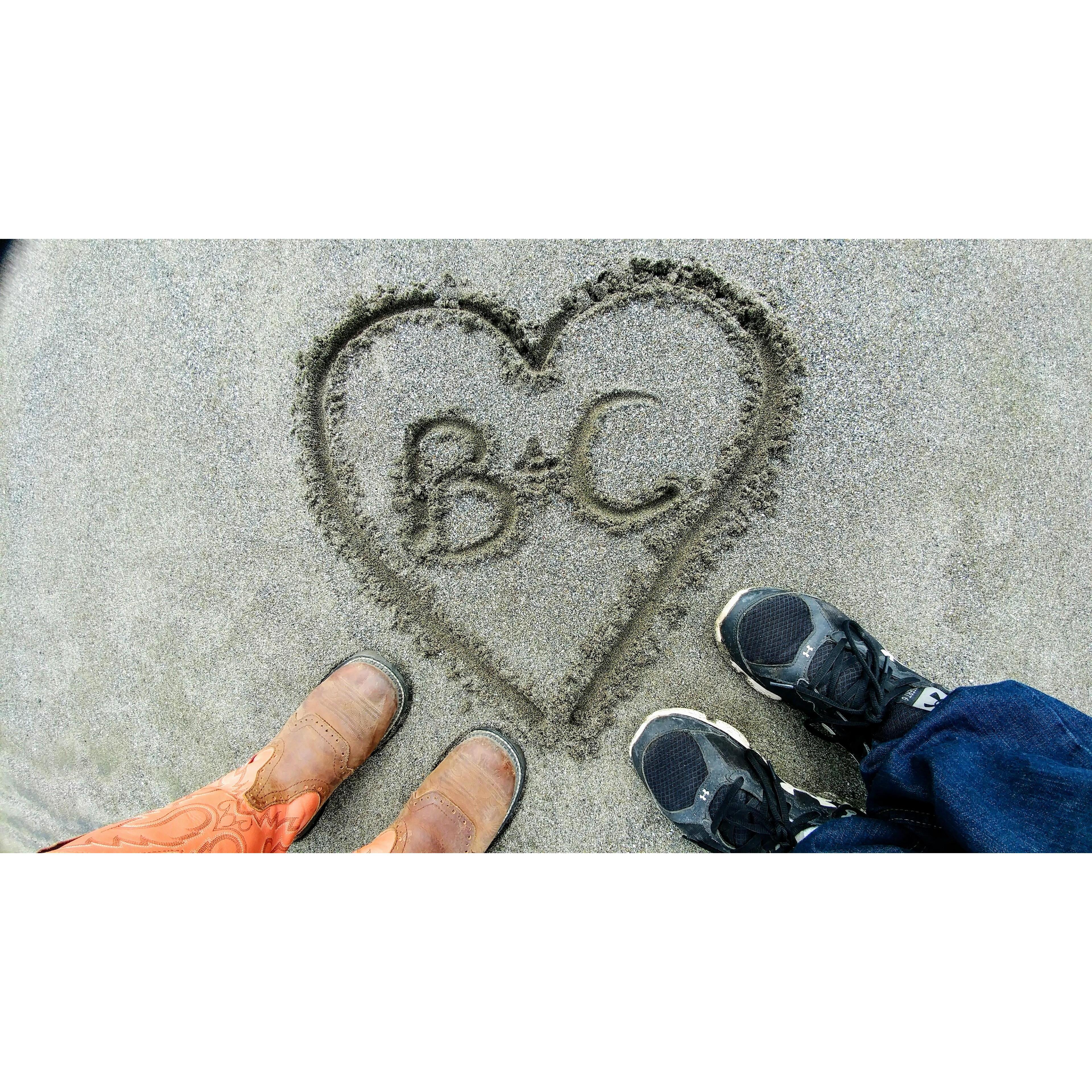 Nothing says love like letters in the sand ;)