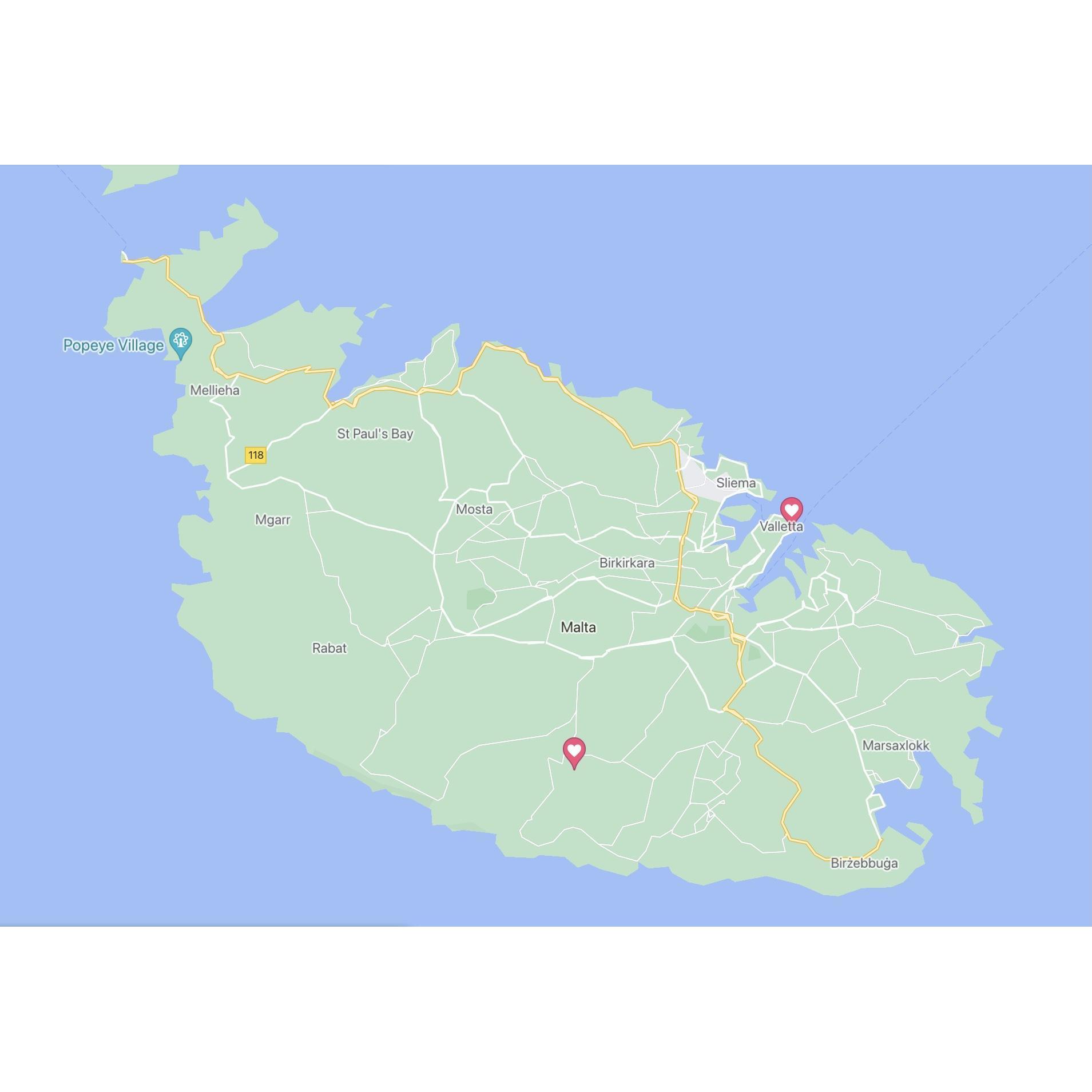 The 2 heart pins show the ceremony venue in Valletta and the reception venue in Siggiewi