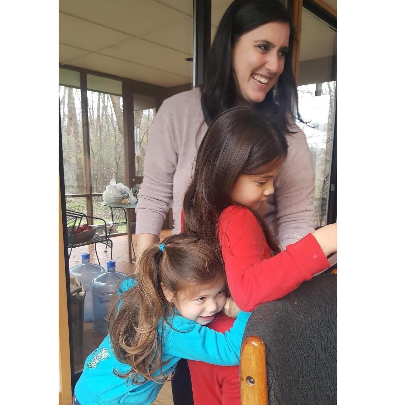 hugging Eva and Elysia post flower girl proposal