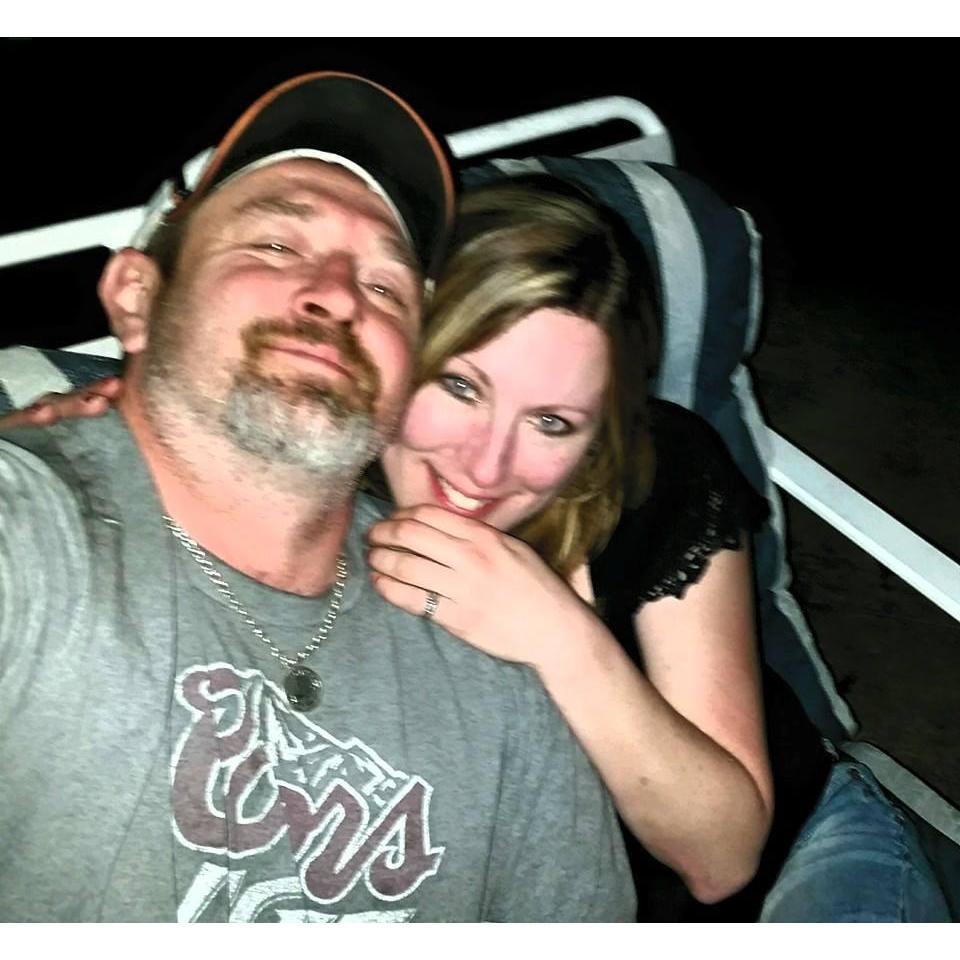 One of our very first pictures together.
Sitting on the patio by the fire.