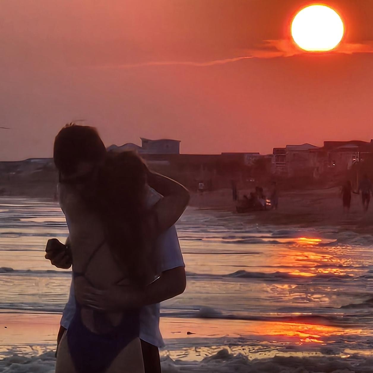 August 17th, Andrew asked micaiah to marry him at Oak Island Beach while walking down the beach