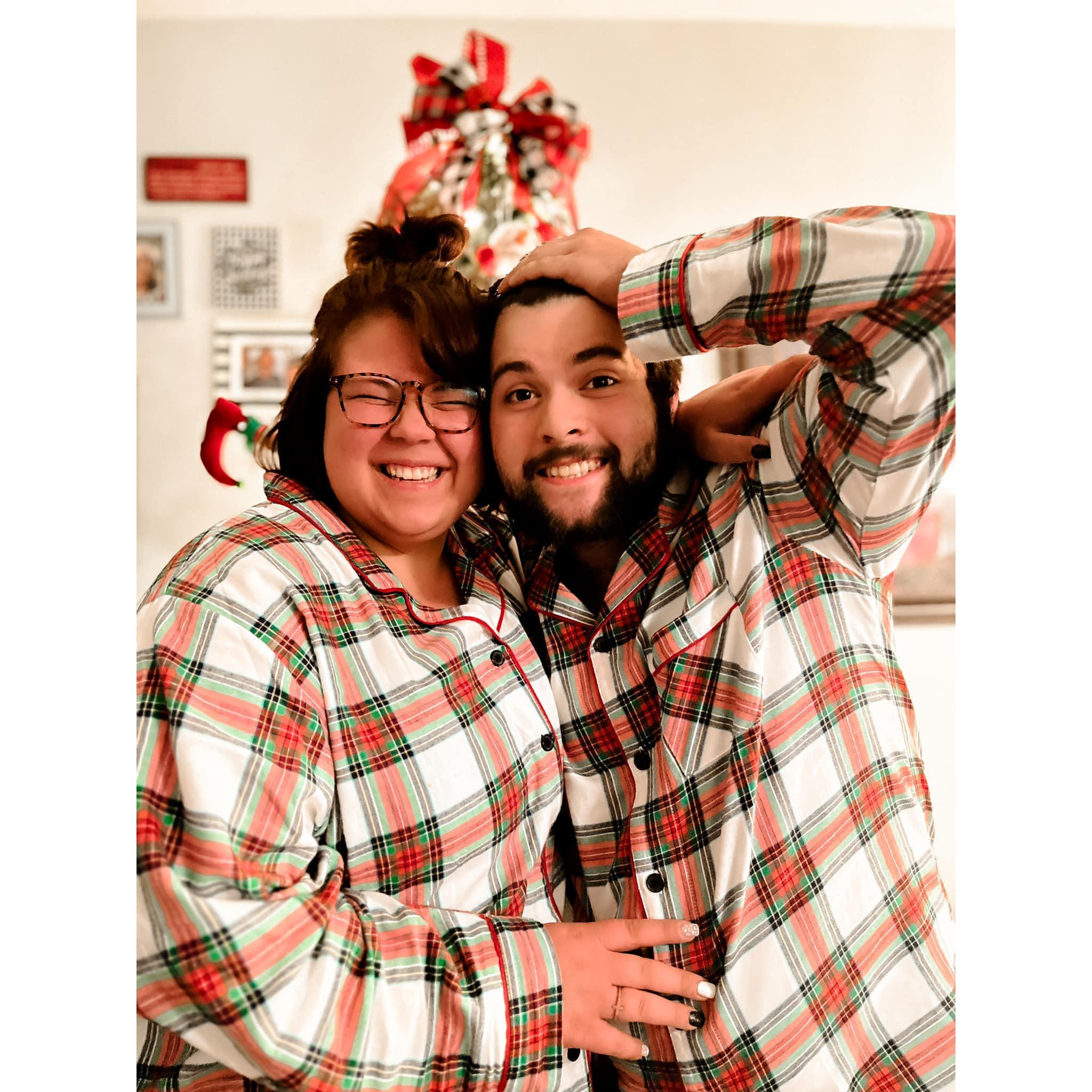 Spent Thanksgiving together and put up a Christmas tree in matching pjs