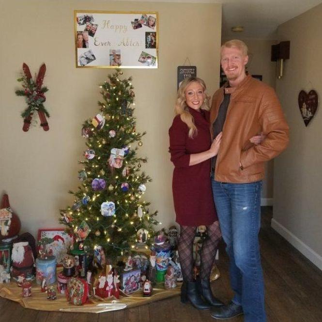 Our Engagement Christmas tree full of photos from our adventures Lorraine's mom created for our (virtual) engagement party. December 2020 was also our first official Christmas spent together.